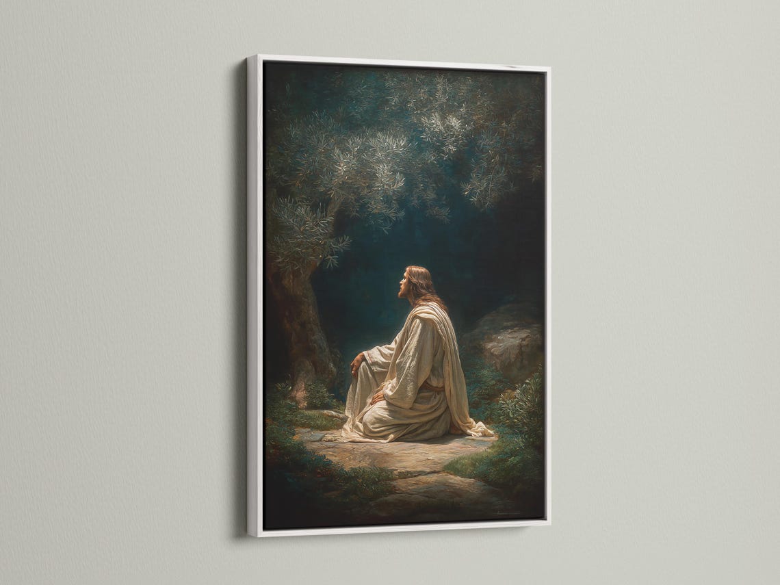 Seated praying figure in light robes in a dark green forest with glowing leaves detail view