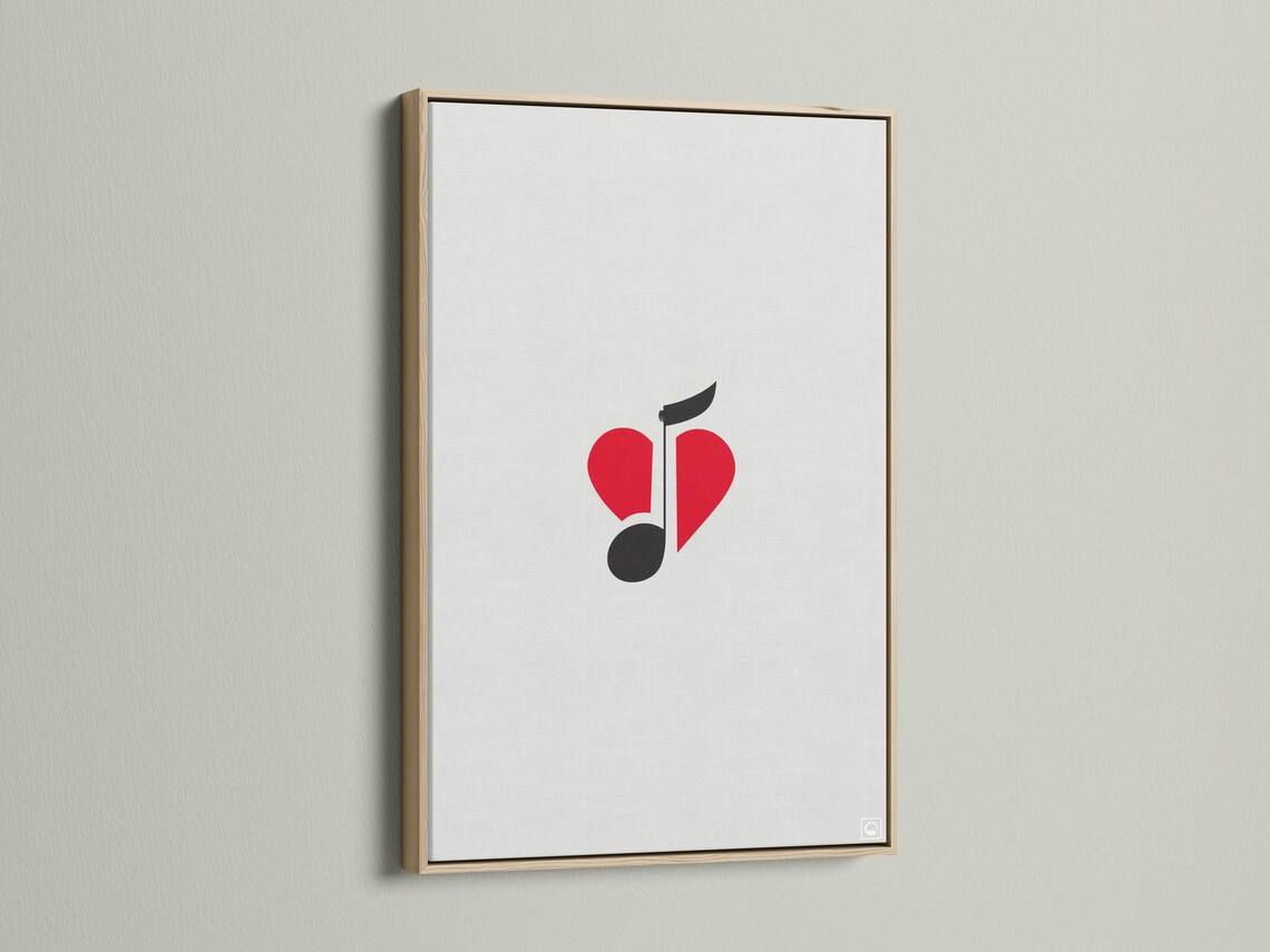Wall mockup of minimalist red heart and black music note artwork