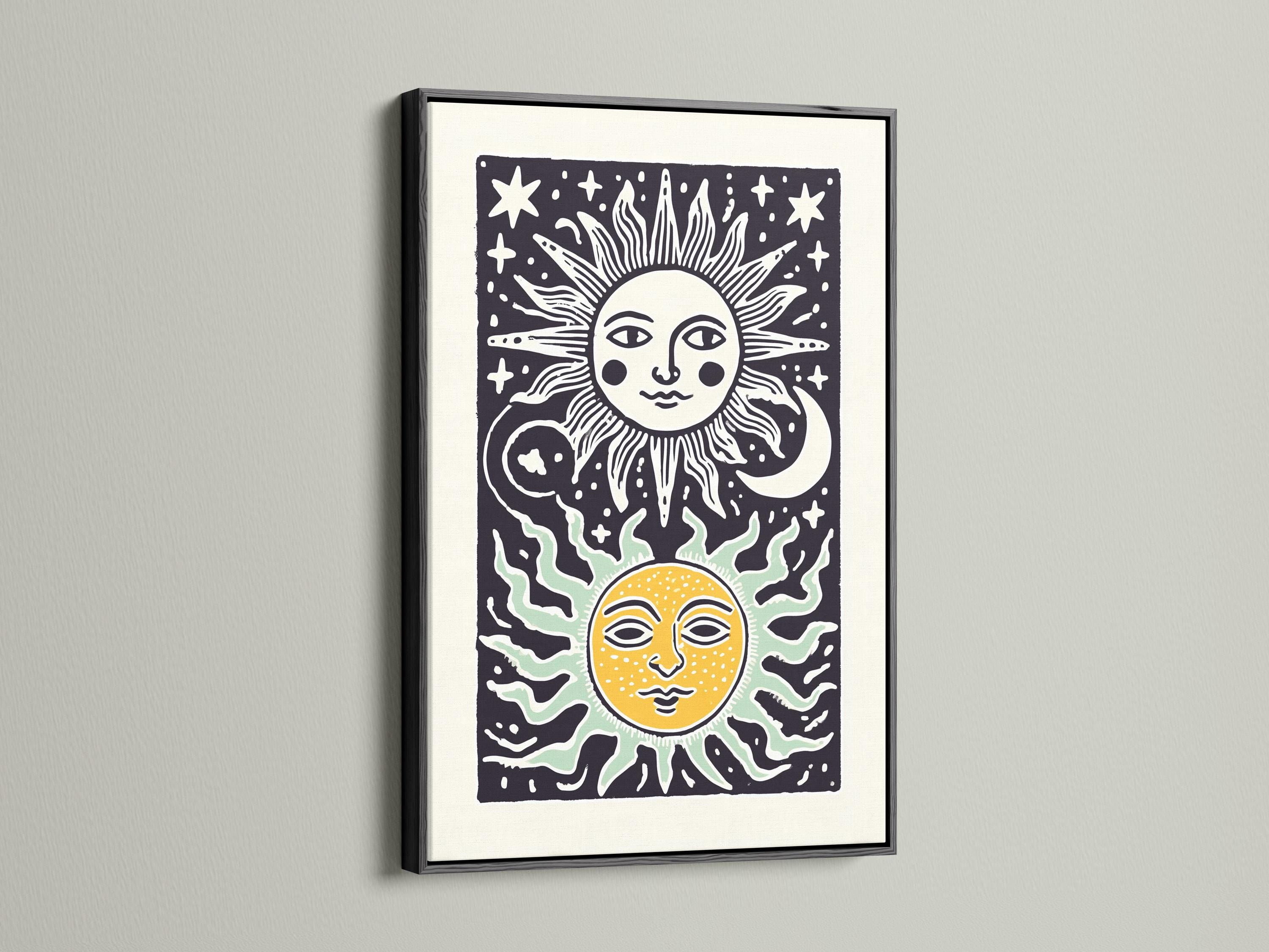 Room mockup showing framed sun and moon celestial artwork on a wall with decorative items nearby