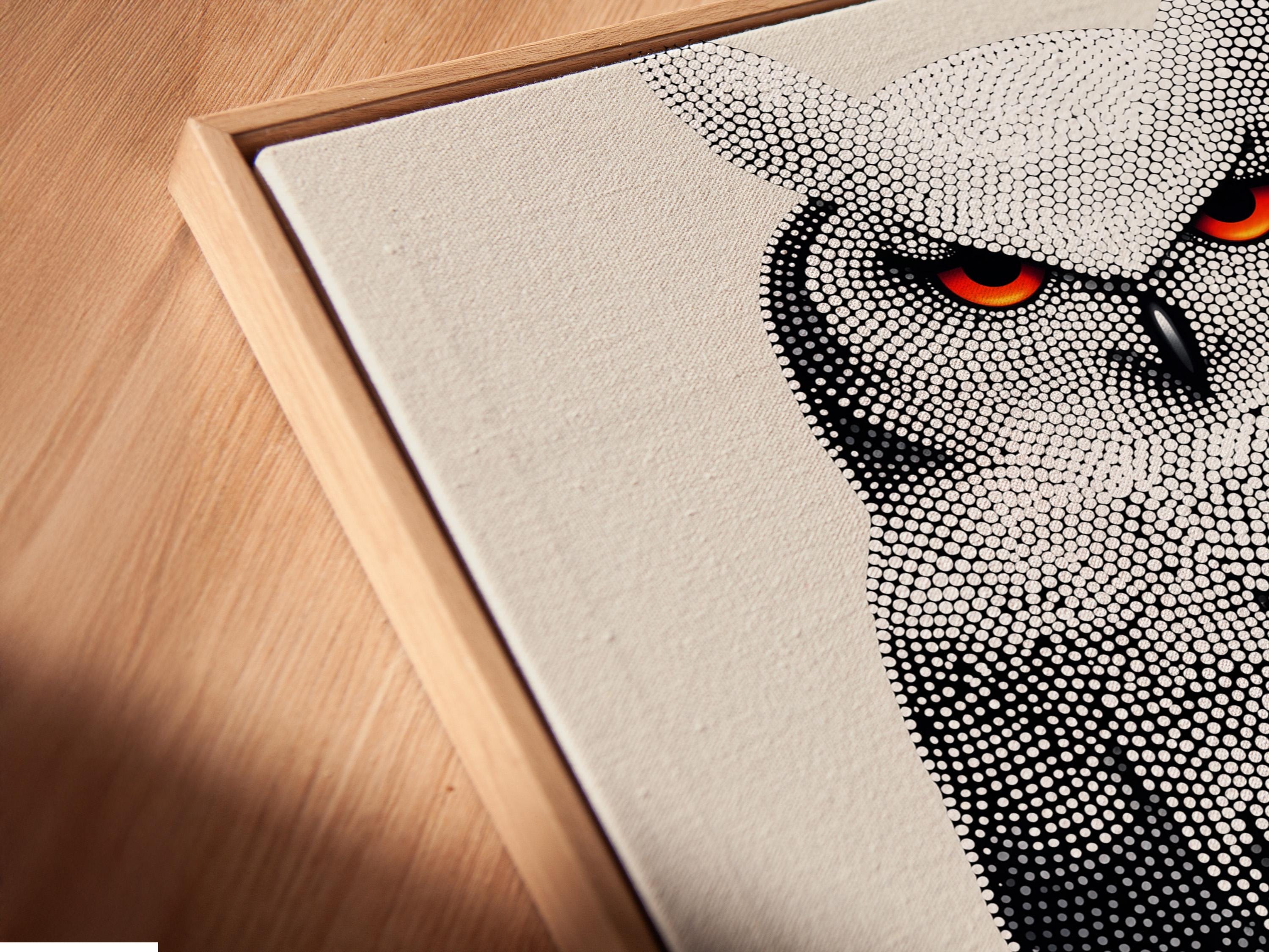 Dotted owl artwork in black and white with bright red-orange eyes detail view
