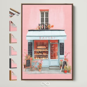 May include: A framed art print of a bakery with a light blue awning and the word "BAKERY" in white letters. The building is painted pink with a window above the awning. The bakery has a display of baked goods.
