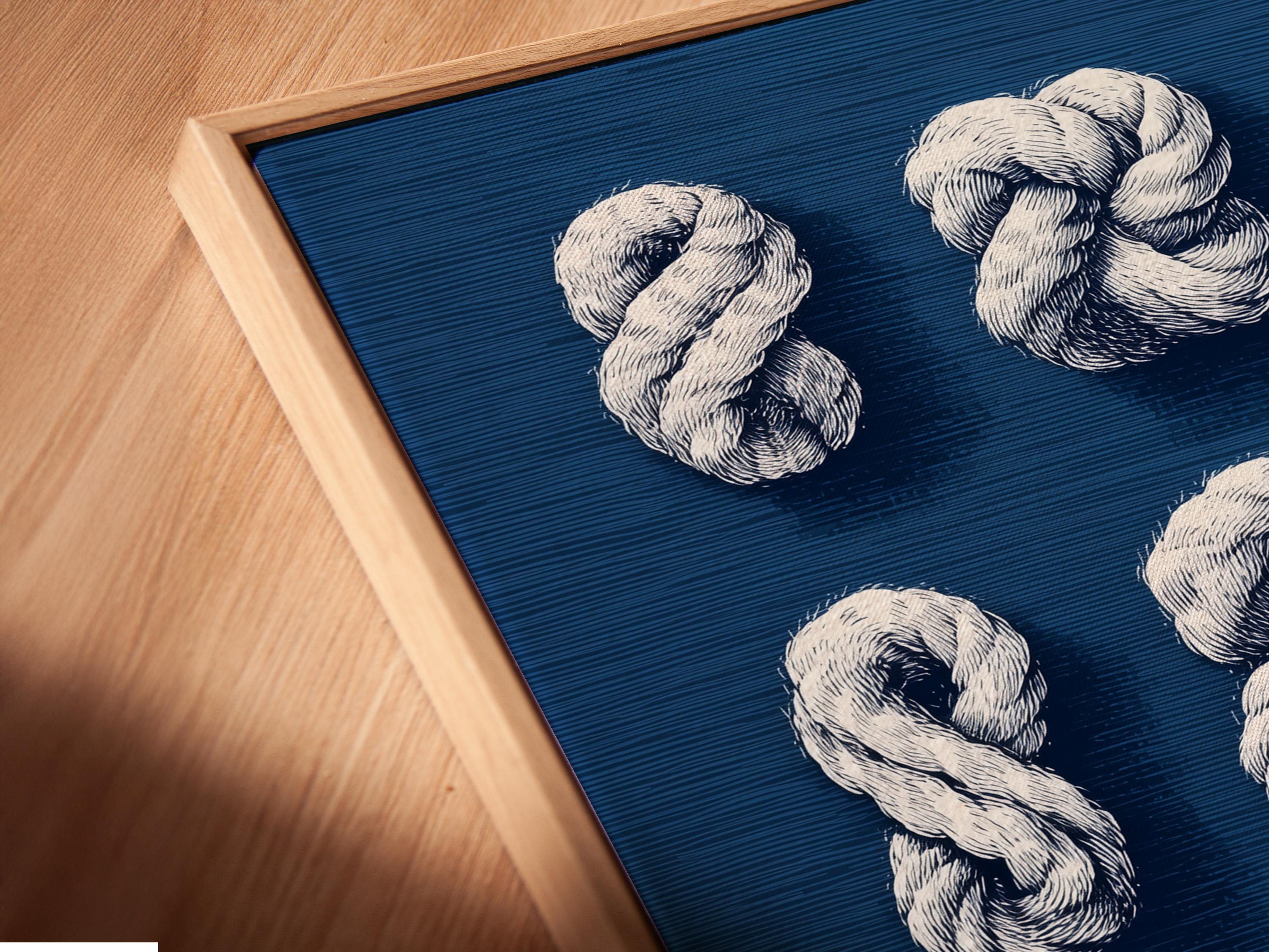 Nine white rope knots arranged on a navy blue background detail view