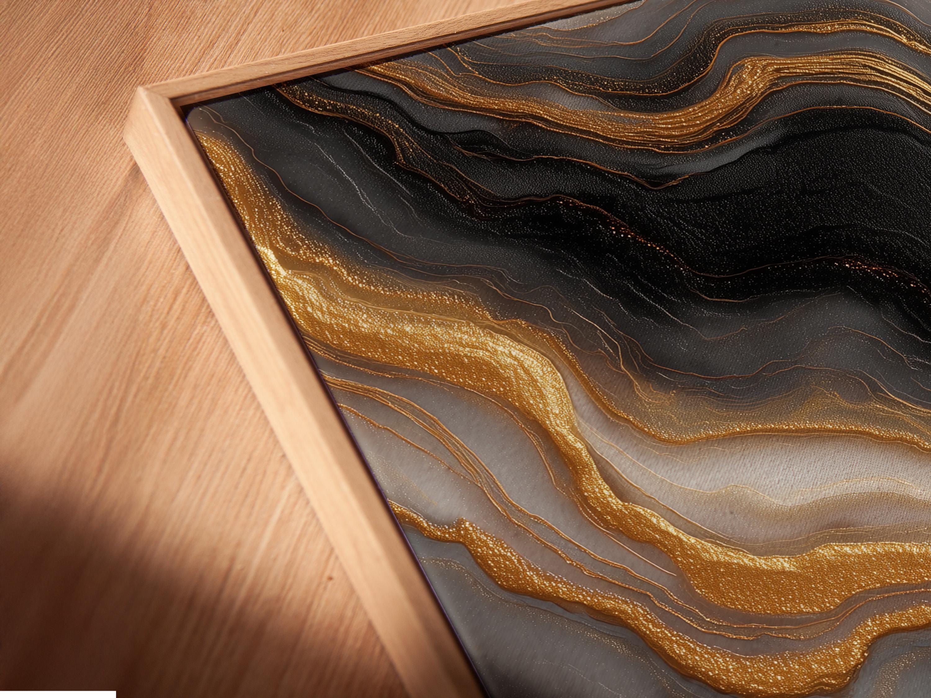 Abstract marble-like design with black and grey swirls and gold vein lines detail view