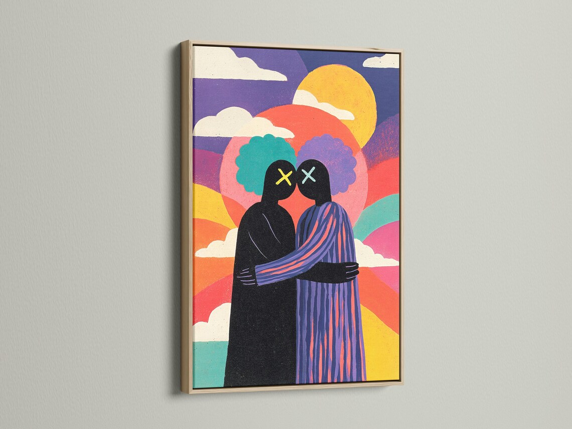 Mockup showing a framed artwork of a colourful sunset couple silhouette on a white wall
