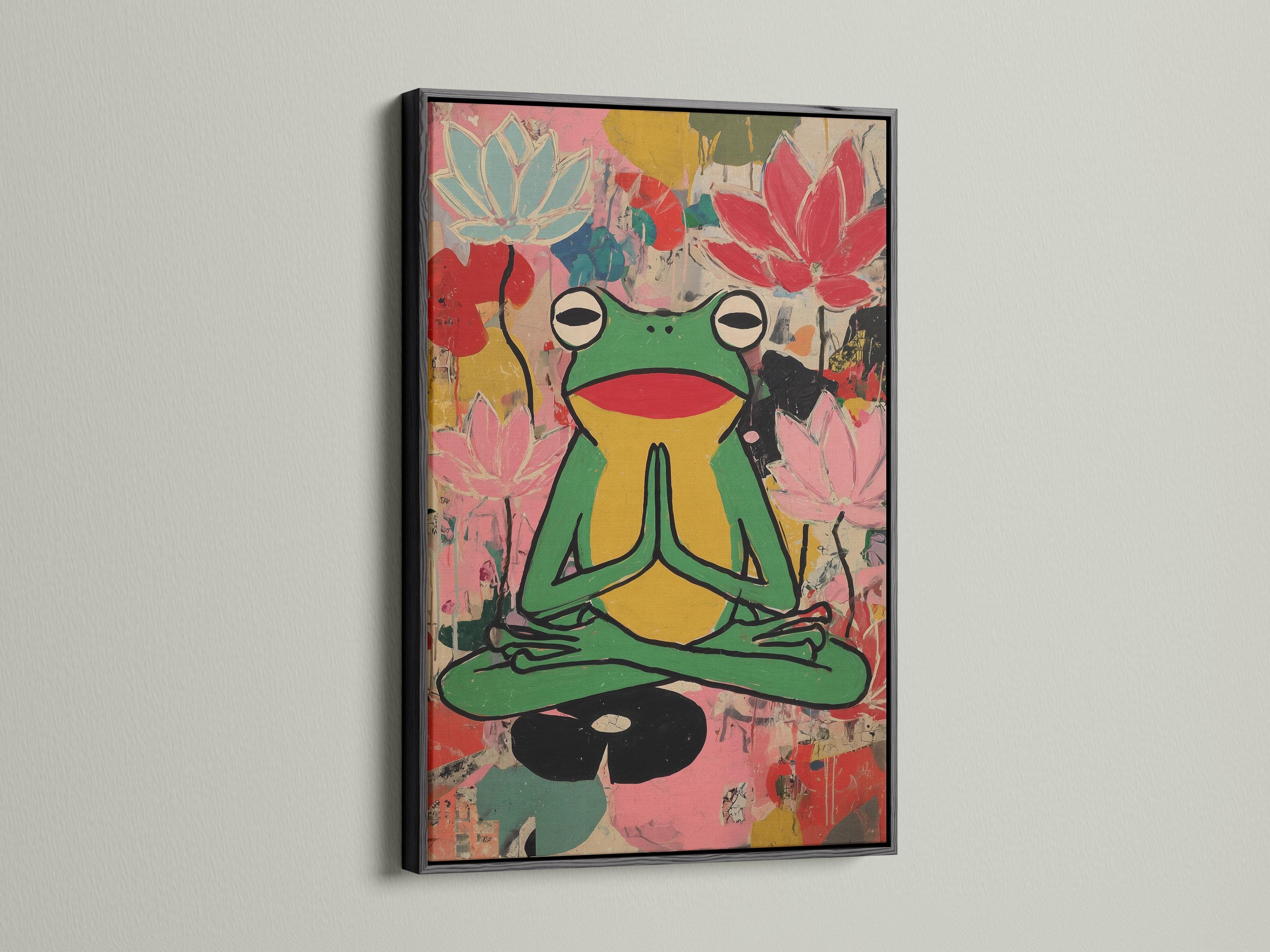 Stylised green frog meditating with pink lotus flowers in a colourful collage background detail view