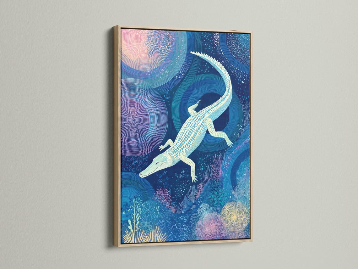 Alligator-themed underwater artwork in a brown frame shown on a wall with small packaging images around it