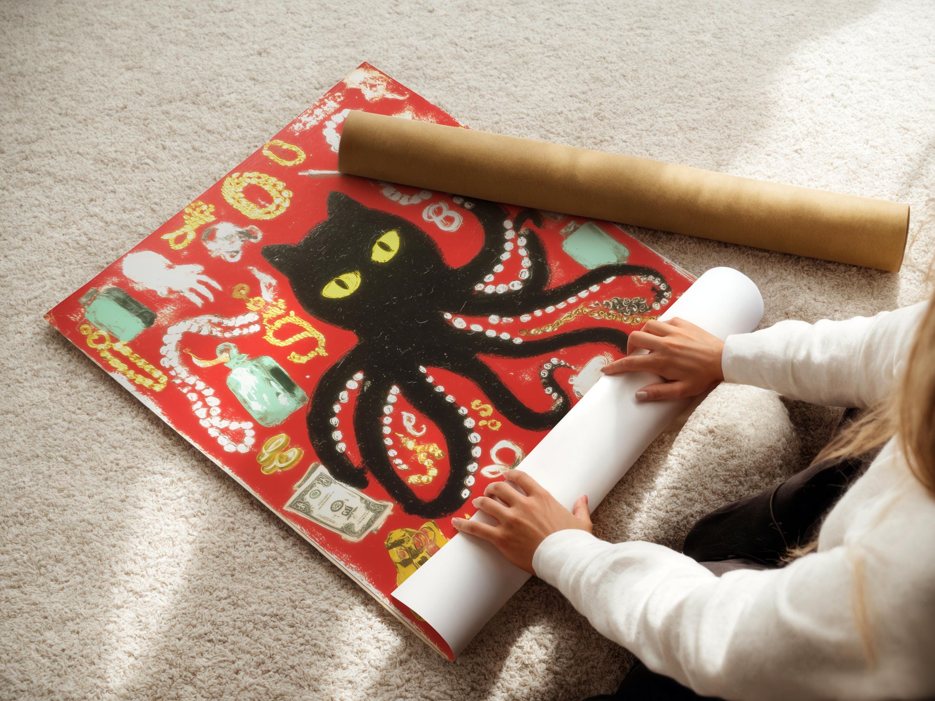 Black cat with yellow eyes in a red octopus-like animal collage with gold and bead-like details detail view