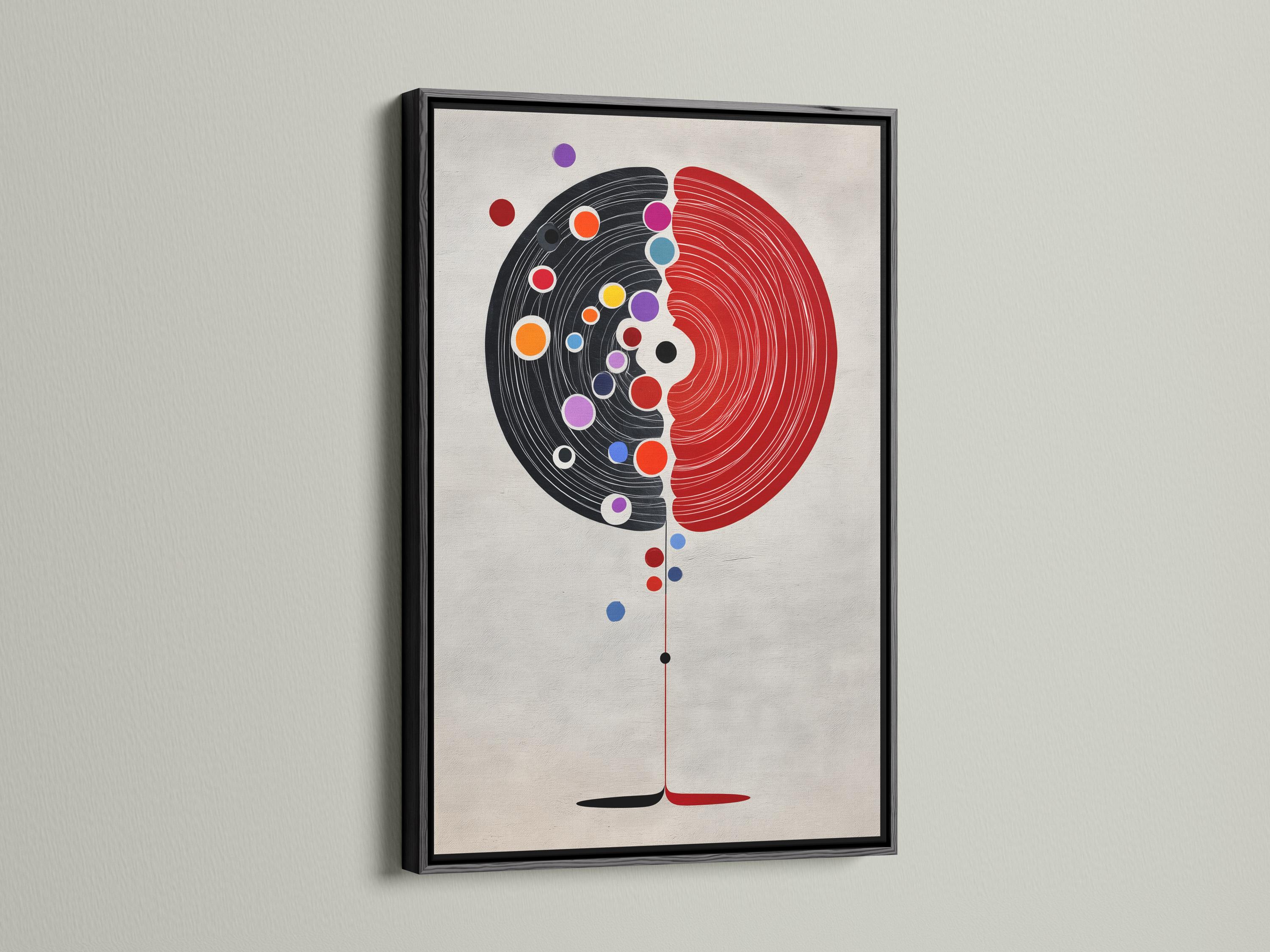 Abstract split circle design with red and black concentric arcs and colourful dot accents detail view