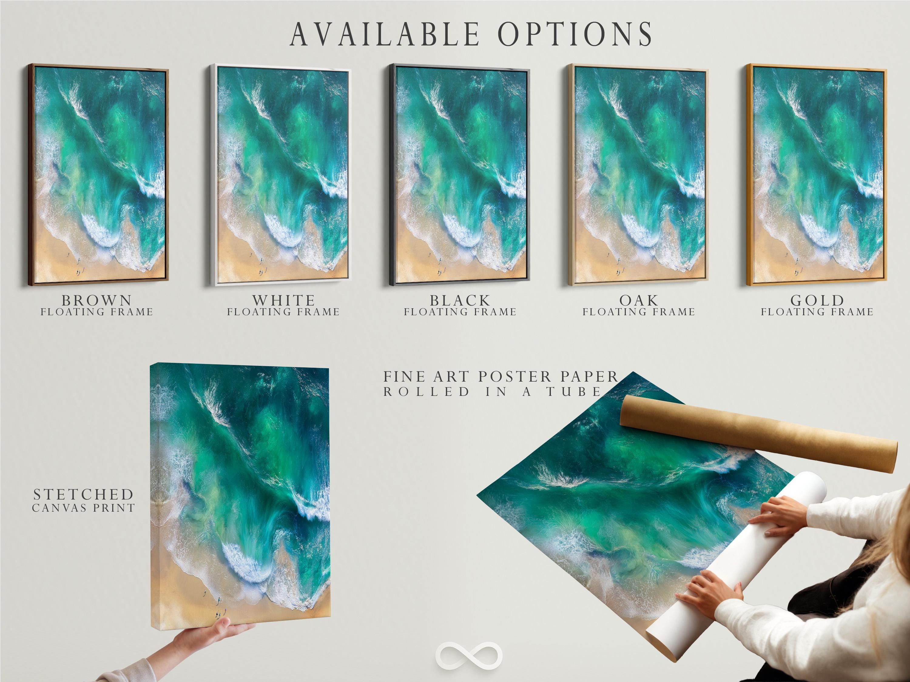 Aerial view of turquoise ocean waves with white foam meeting a sandy beach detail view