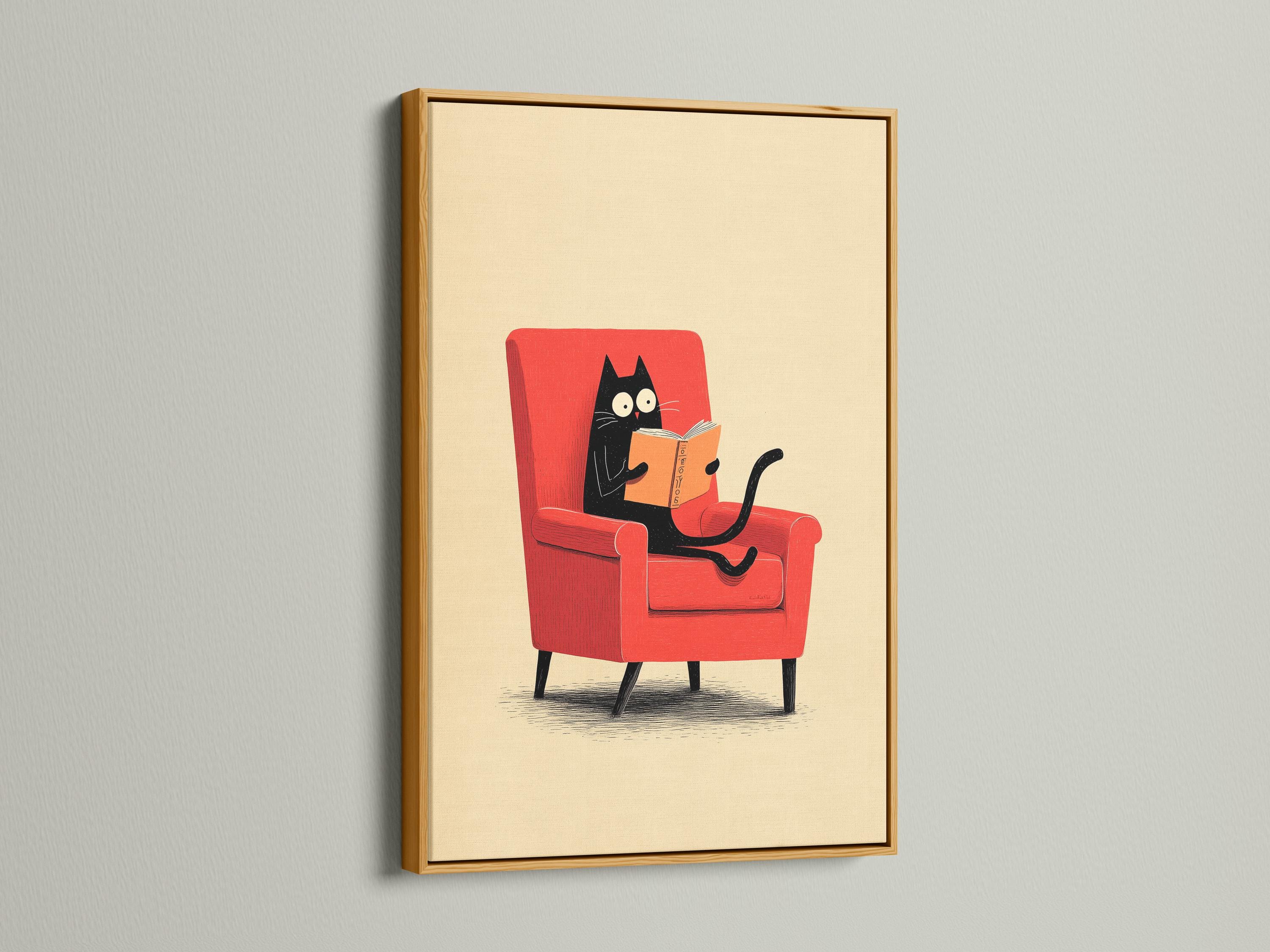 Illustrated black cat reading an orange book while seated in a red armchair detail view