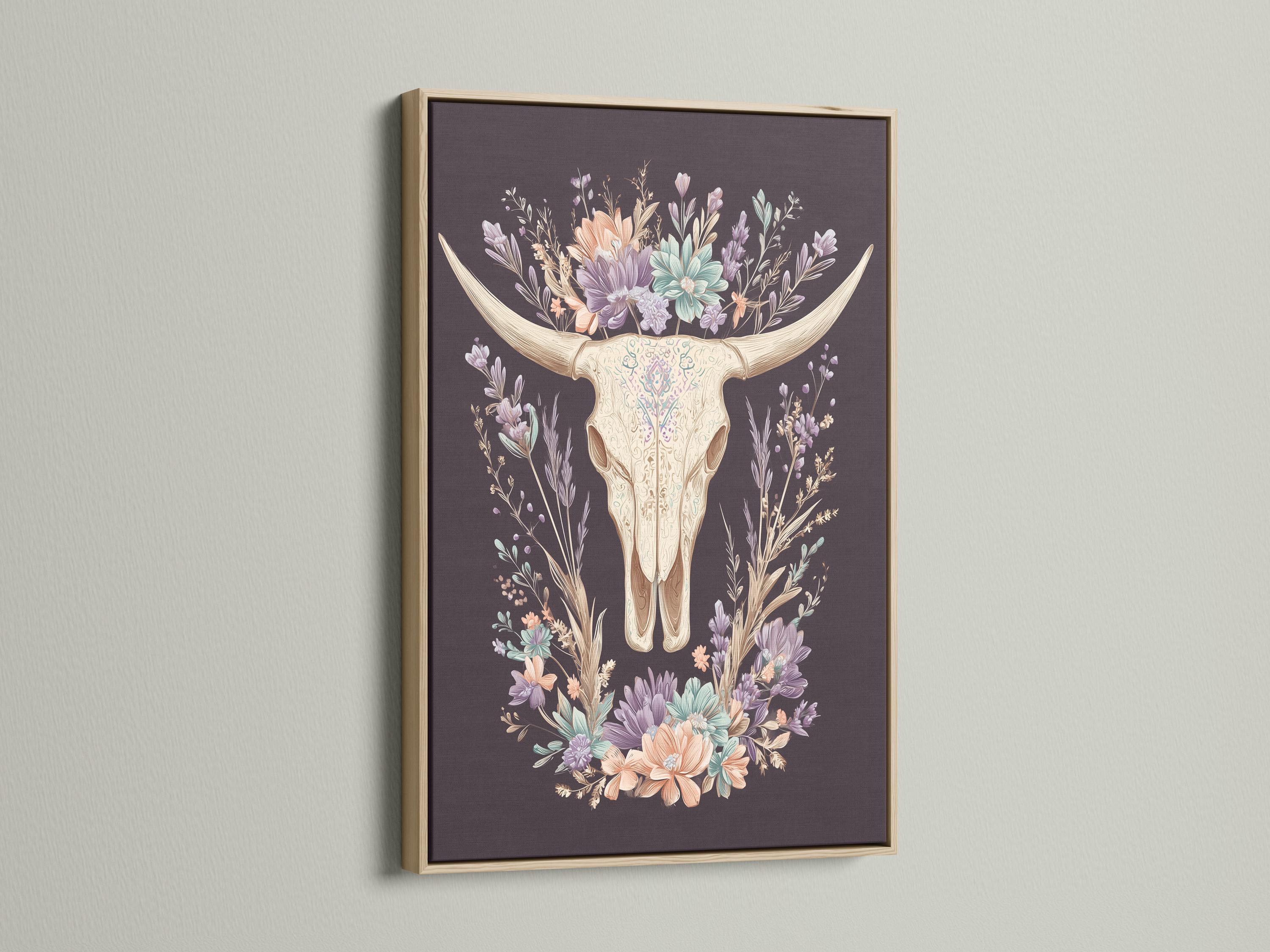 Bull skull illustration surrounded by a wreath of pastel wildflowers on a dark mauve background detail view
