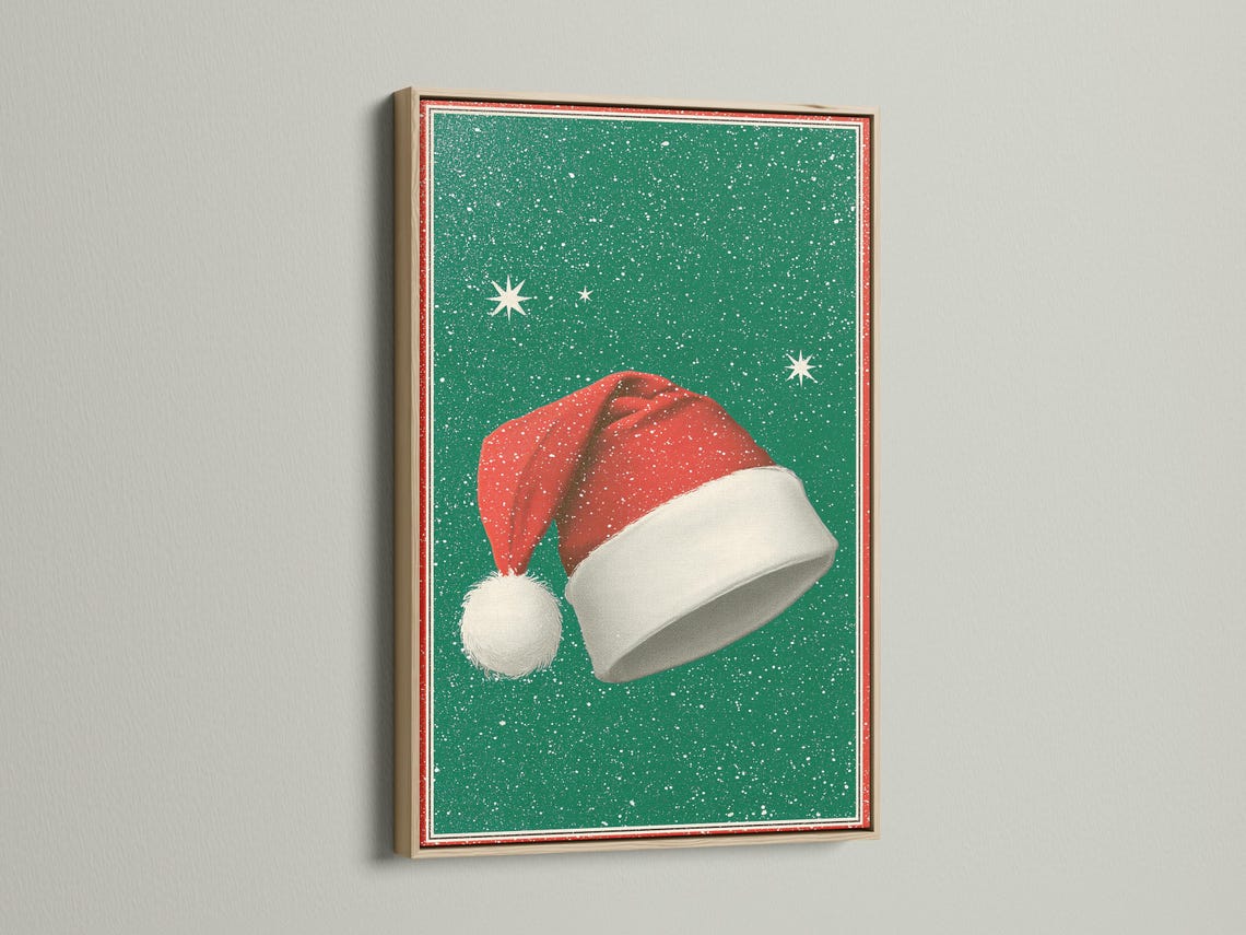 Room mockup featuring a framed Santa hat artwork on an emerald green speckled background