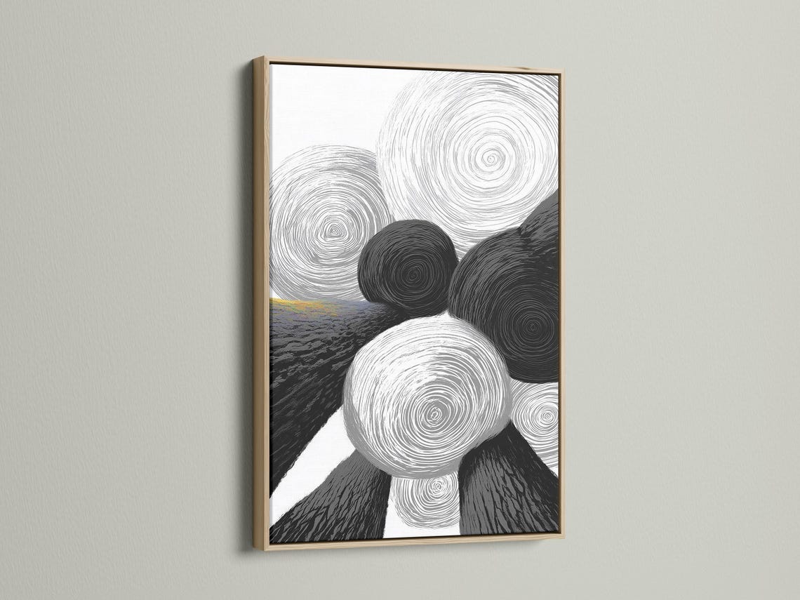 Monochrome abstract artwork with overlapping swirling rings in black, white and grey detail view