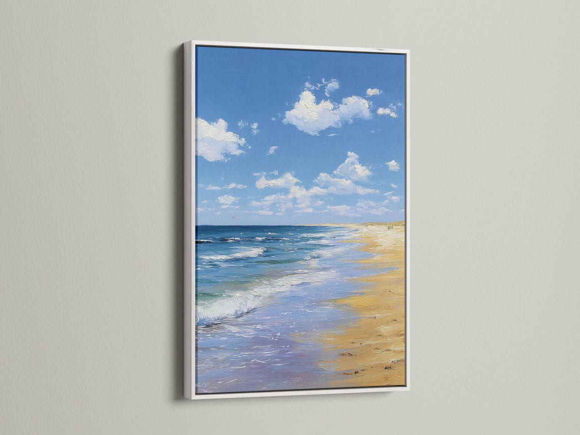 Room mockup showing a framed blue beach seascape artwork on a wall