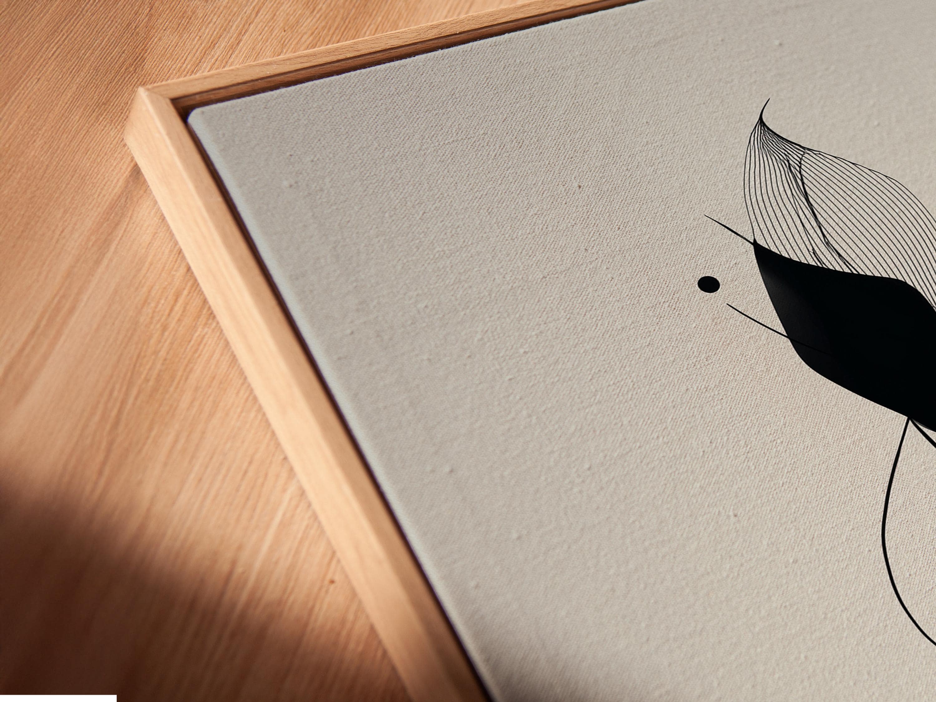 Monochrome abstract flower line art with layered black petals, fine curves and a small red dot detail view