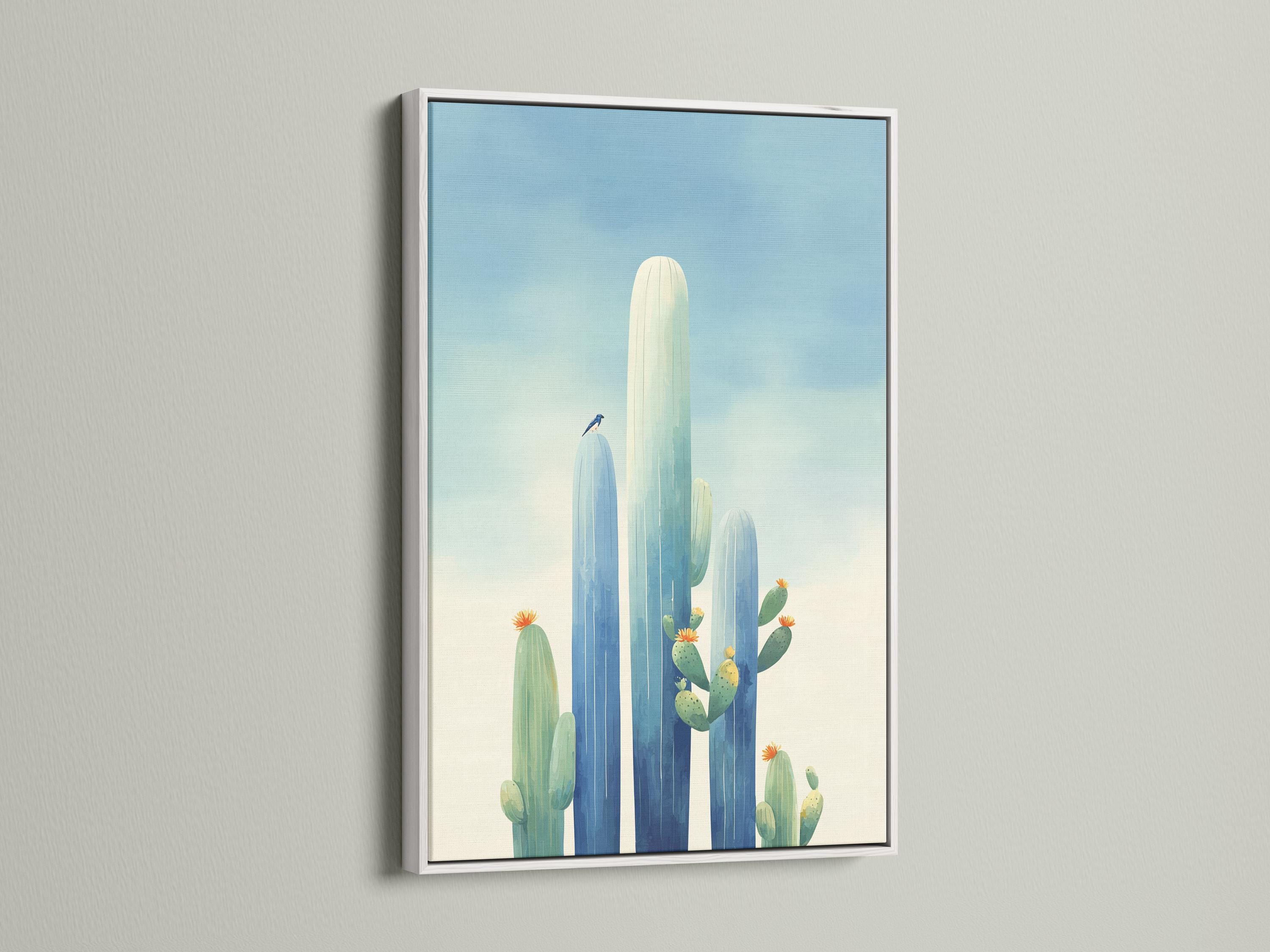 Framed cactus desert artwork with tall blue-green cacti and small orange blossoms against a pale blue sky detail view