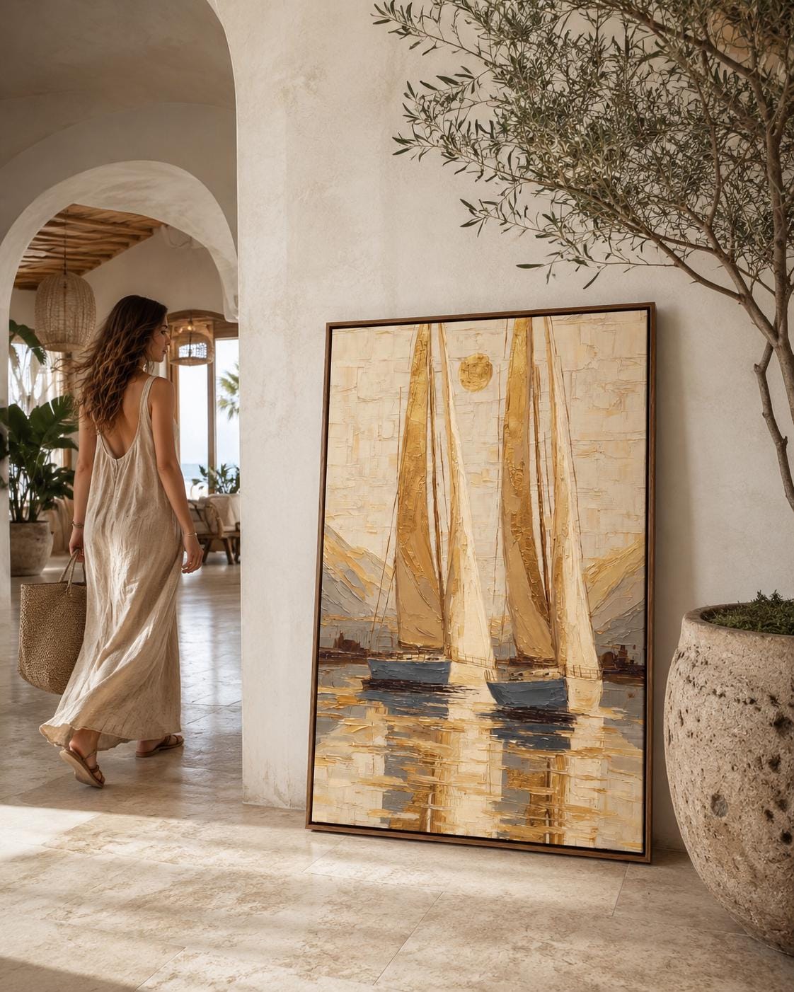 A framed nautical sailboat seascape painting on a wall above a dark sofa in a wood interior