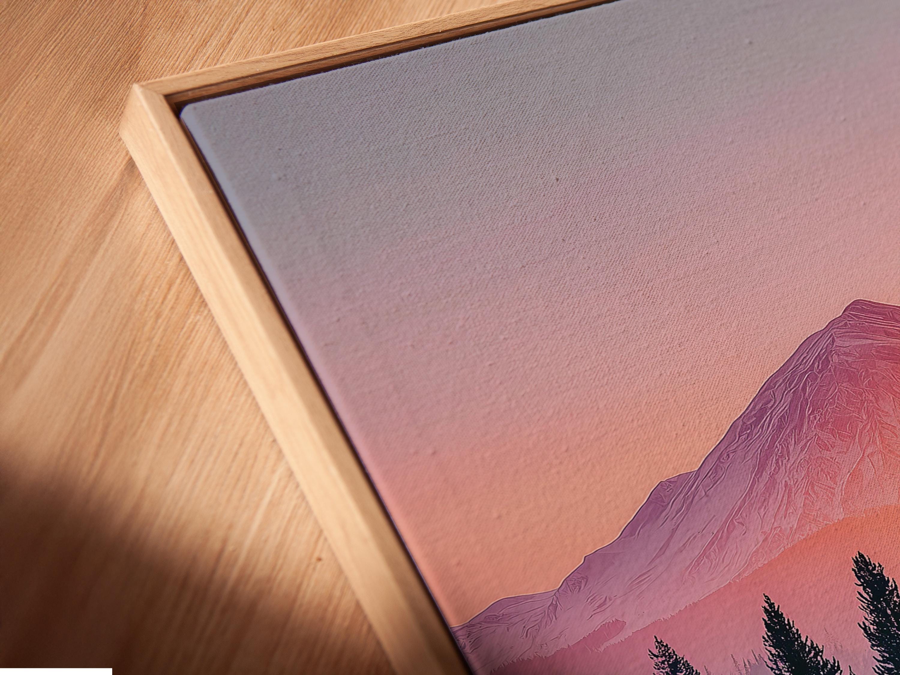 A pastel mountain landscape at sunset shows a pink-orange sky, a prominent mountain, silhouetted evergreen trees, and a calm mirrored lake reflection