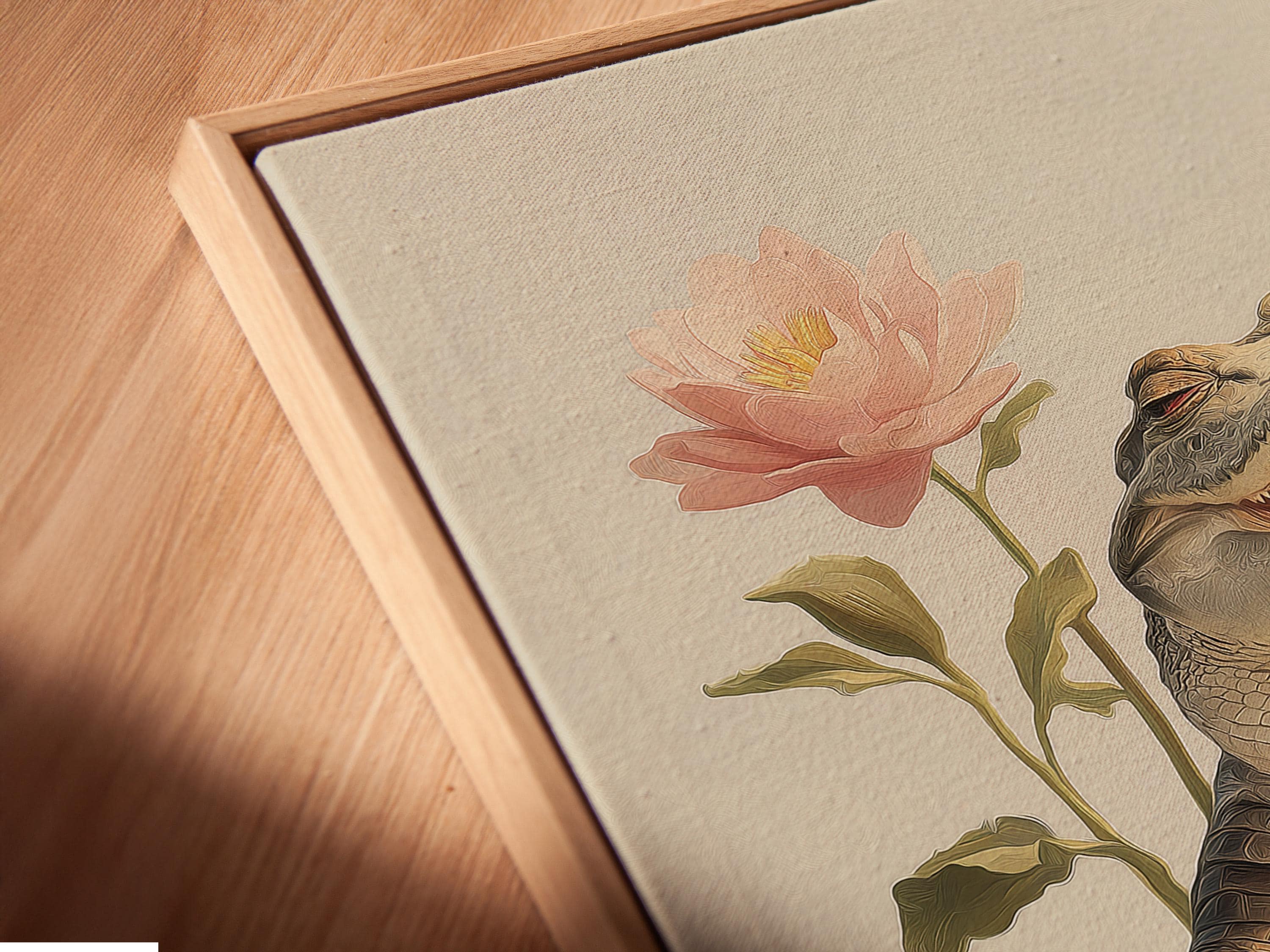 Grey alligator resting on pale pink and cream lotus flowers with green leaves on a light background detail view