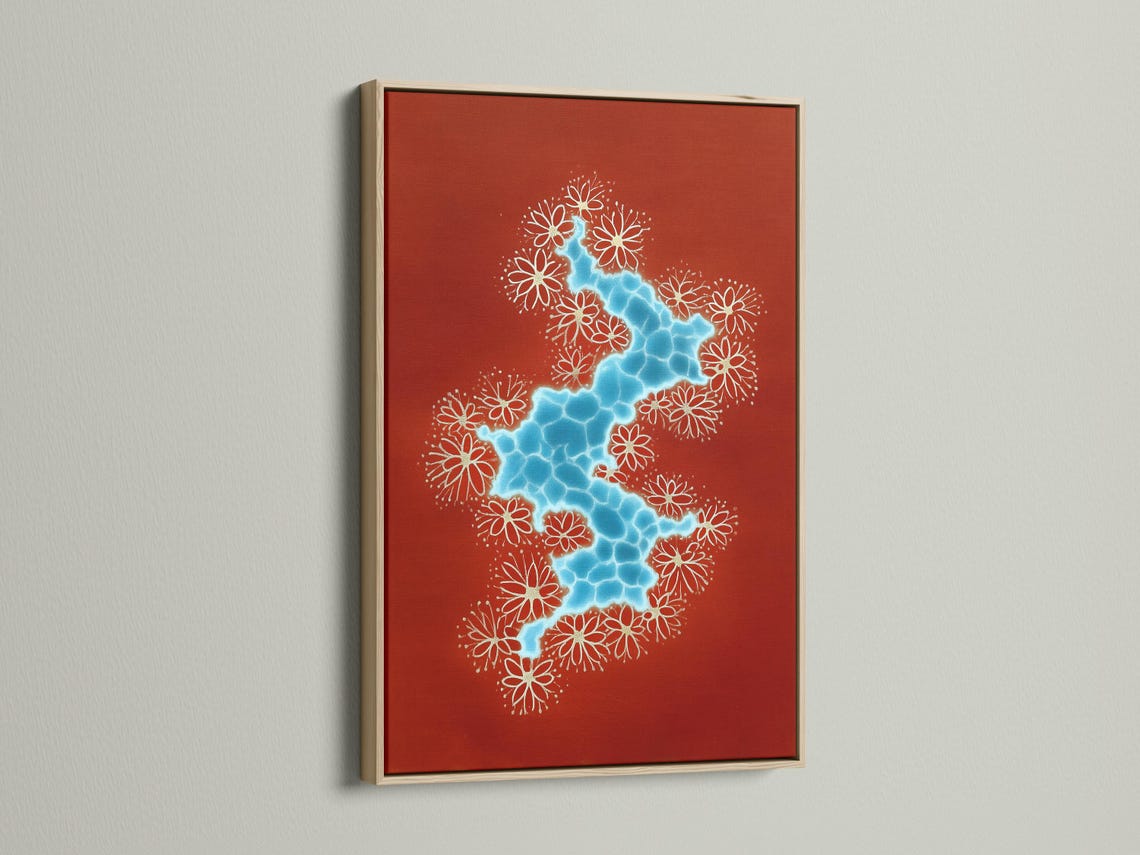 Wall mockup showing framed red abstract river artwork with blue water shape and white flowers