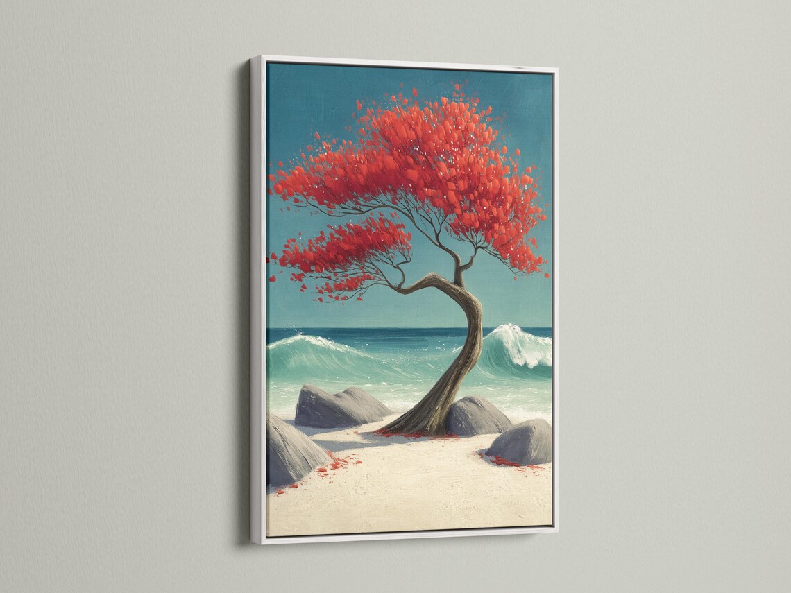 Red tree with spreading branches on a turquoise ocean beach with rocks and foamy waves detail view