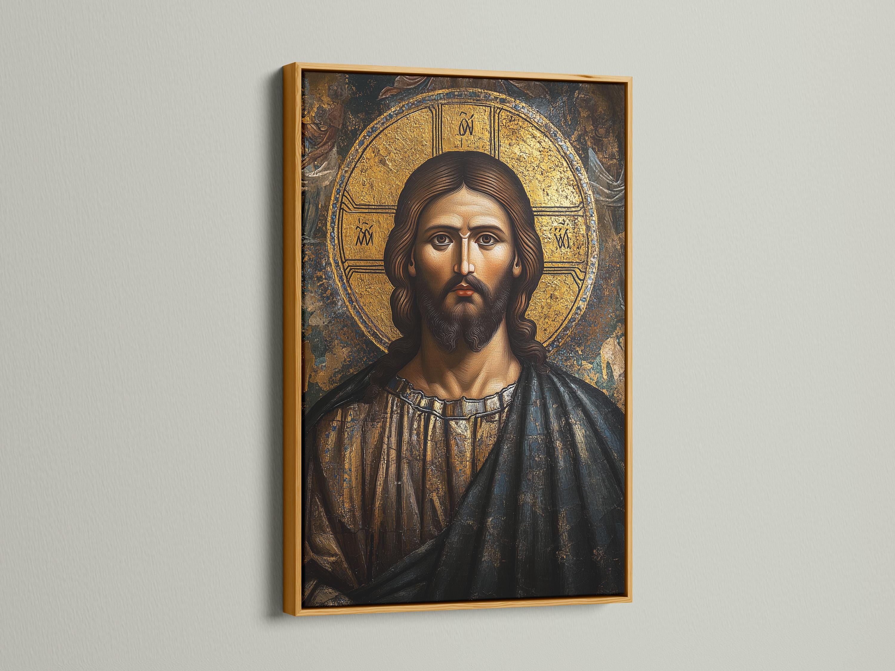 Byzantine-style portrait of Jesus Christ with a gold halo and textured dark background detail view