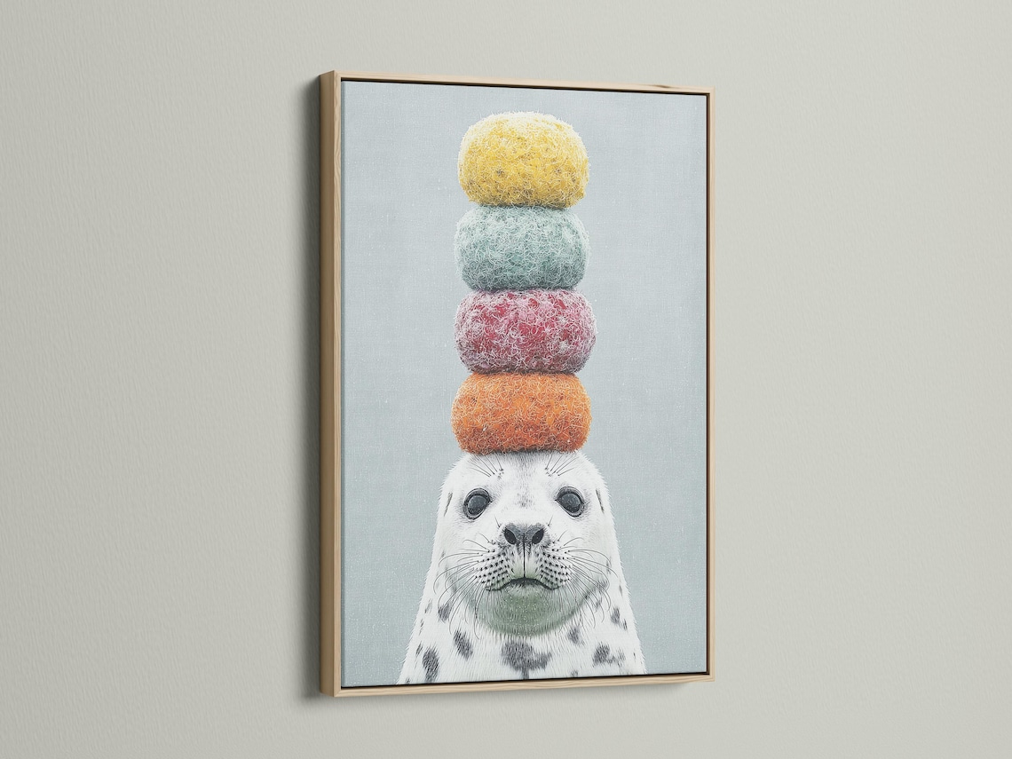 Seal wall art mockup with stacked pastel pom-pom balls