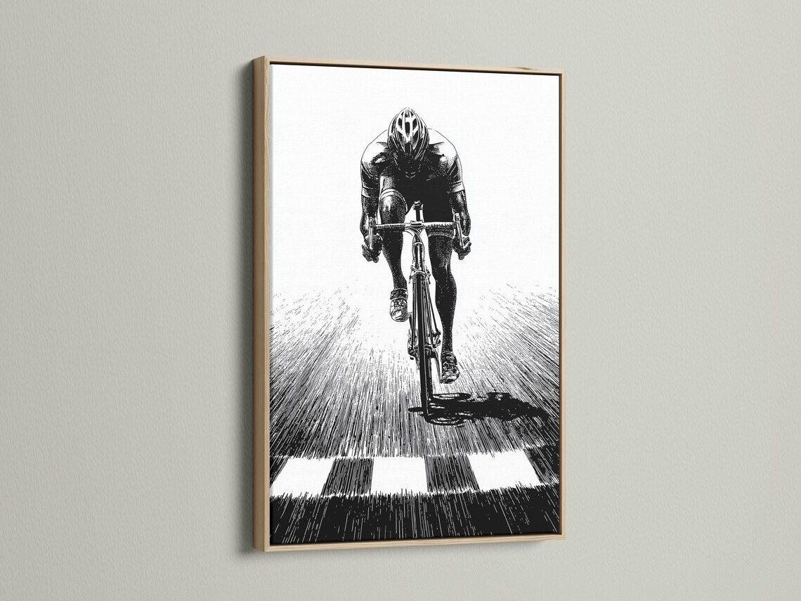 Room mockup showing a framed monochrome cyclist illustration on a light wall