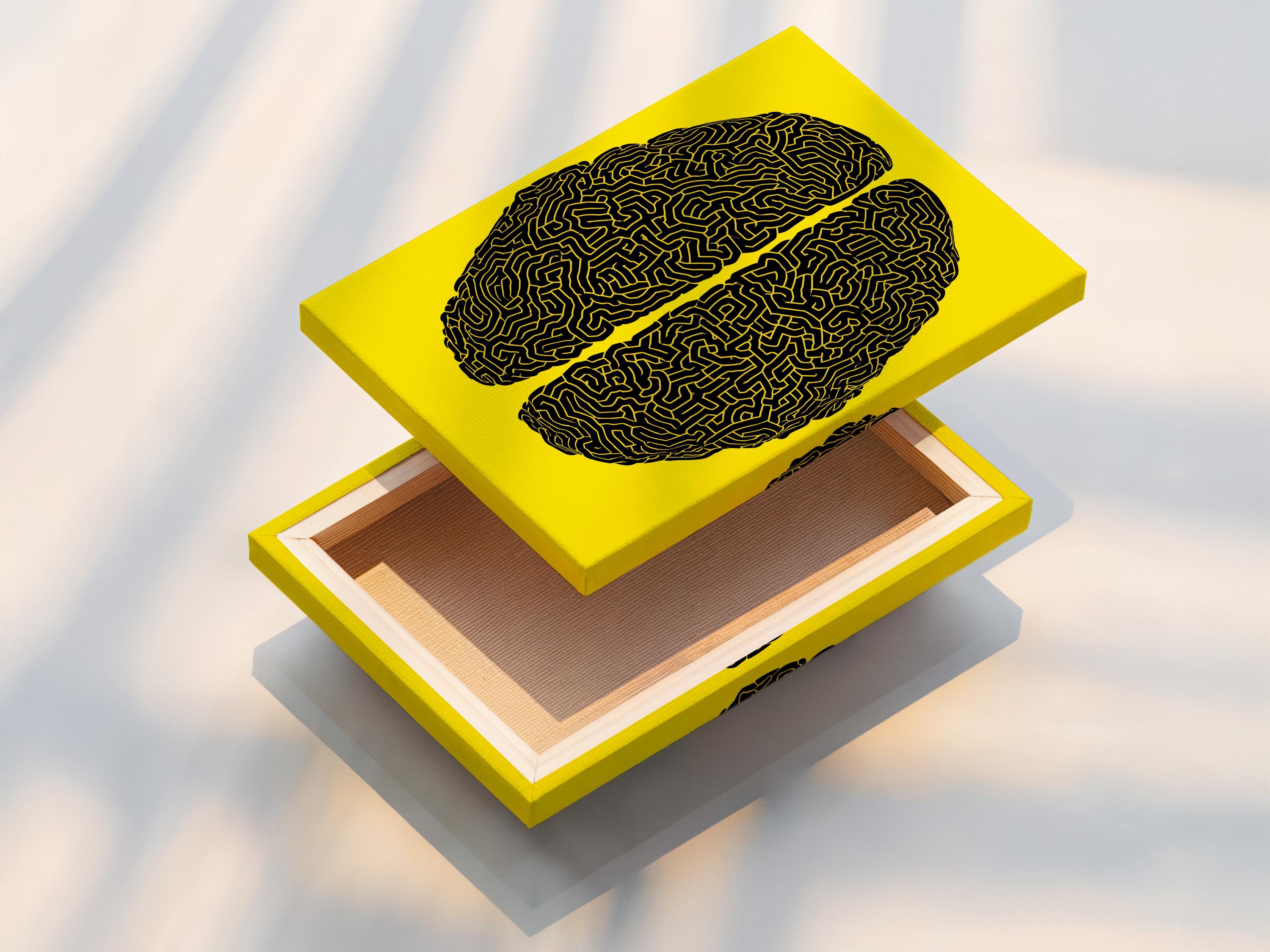 Two black brain silhouettes filled with maze-like lines on a yellow background detail view