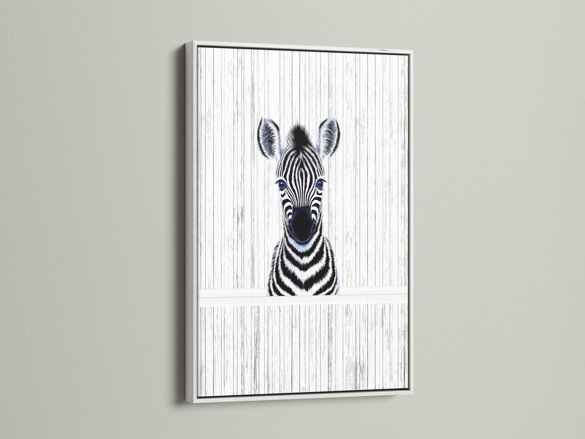 Room mockup showing framed zebra portrait wall art with black and white stripes and blue eyes