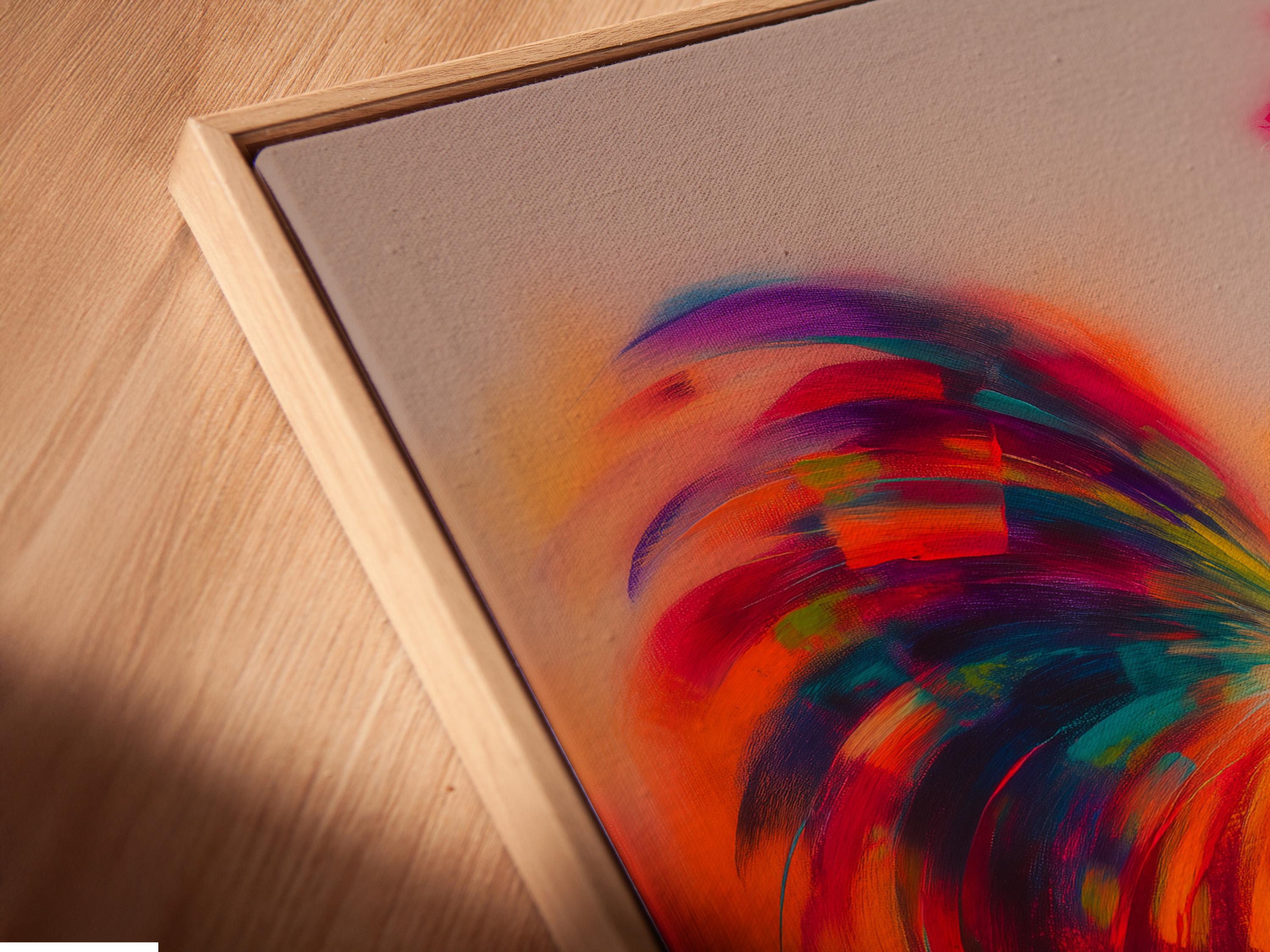 A framed rooster wall artwork in warm orange, pink, and purple colours on a white background
