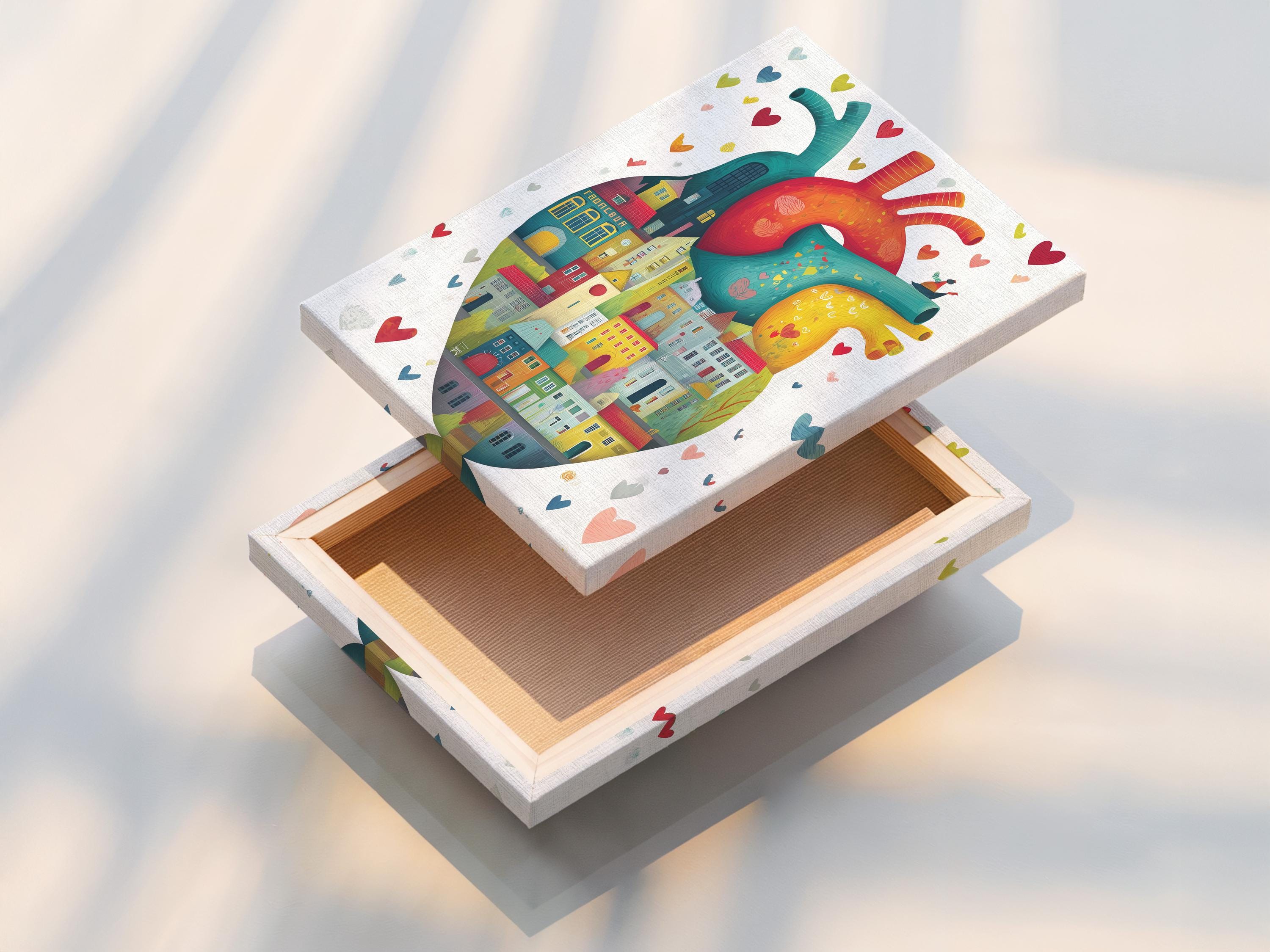 Teal anatomical heart filled with colourful city houses and small floating hearts detail view