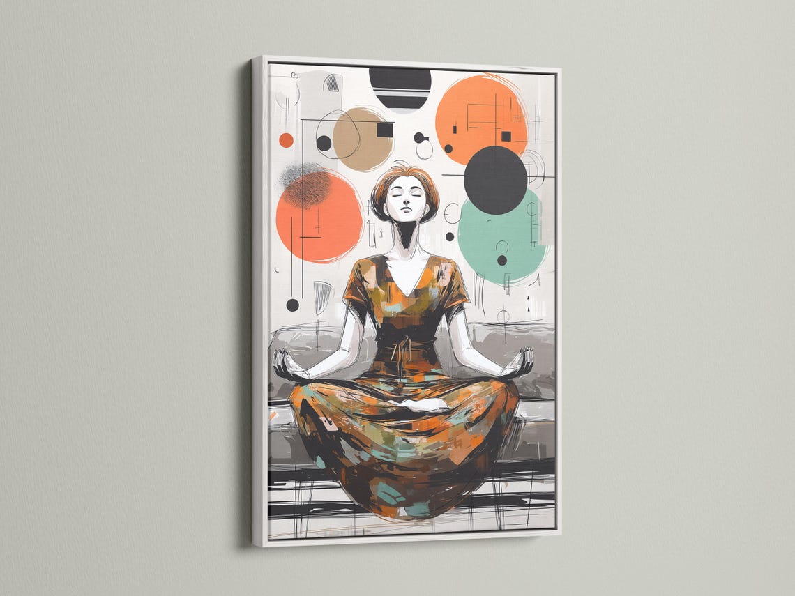 Framed artwork showing a woman meditating with floating geometric circles in orange, teal and charcoal detail view