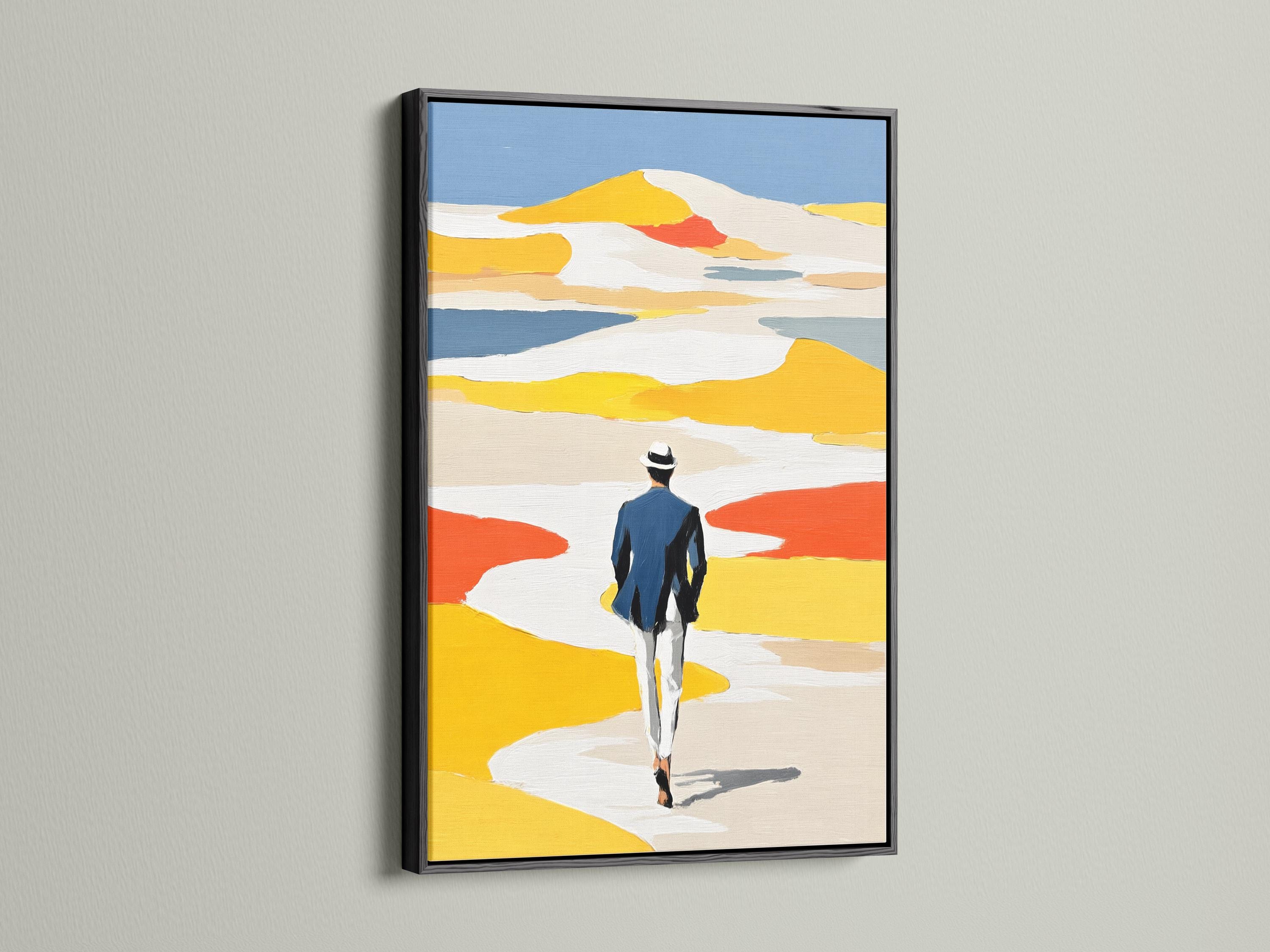 Room mockup featuring framed coastal beach artwork with a person walking away in yellow dunes