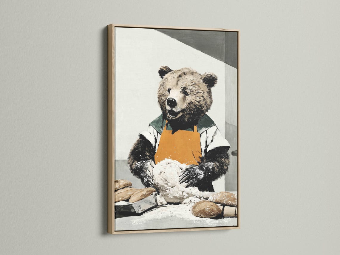 Bear baker artwork with an orange apron, green clothing, and dough on a table detail view