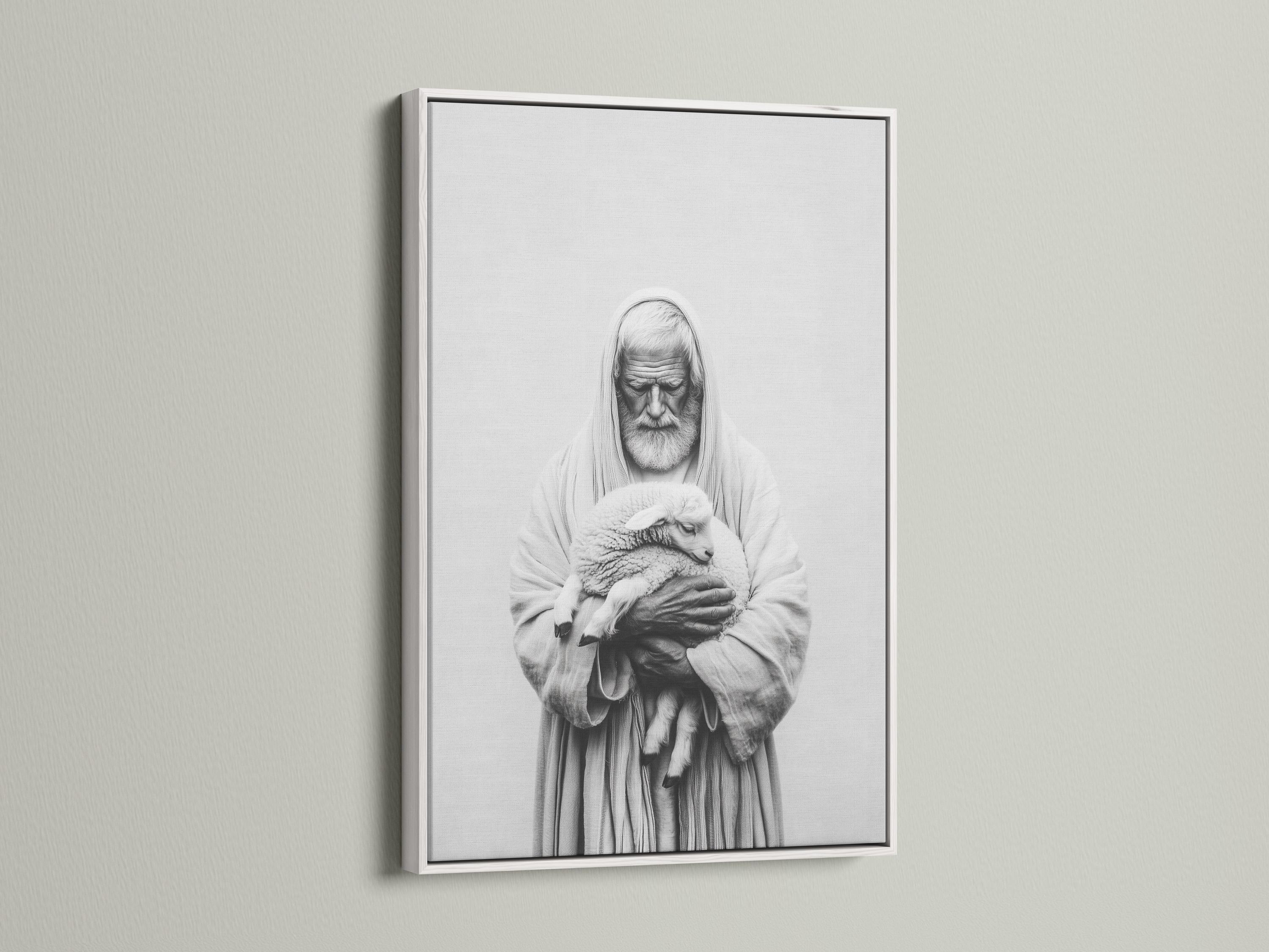 Room mockup showing a framed black-and-white portrait of a hooded shepherd holding a lamb