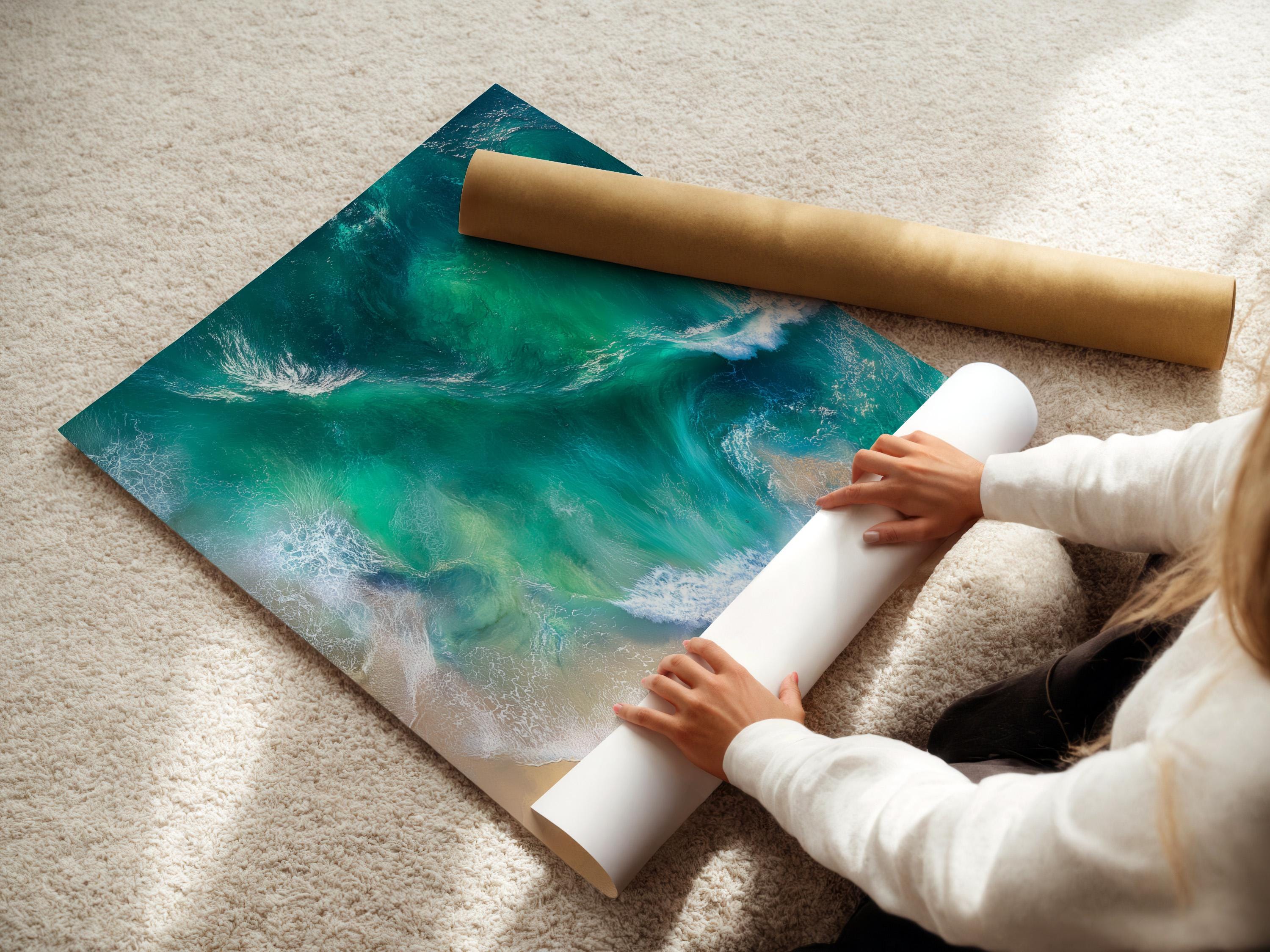 Aerial view of turquoise ocean waves with white foam meeting a sandy beach detail view