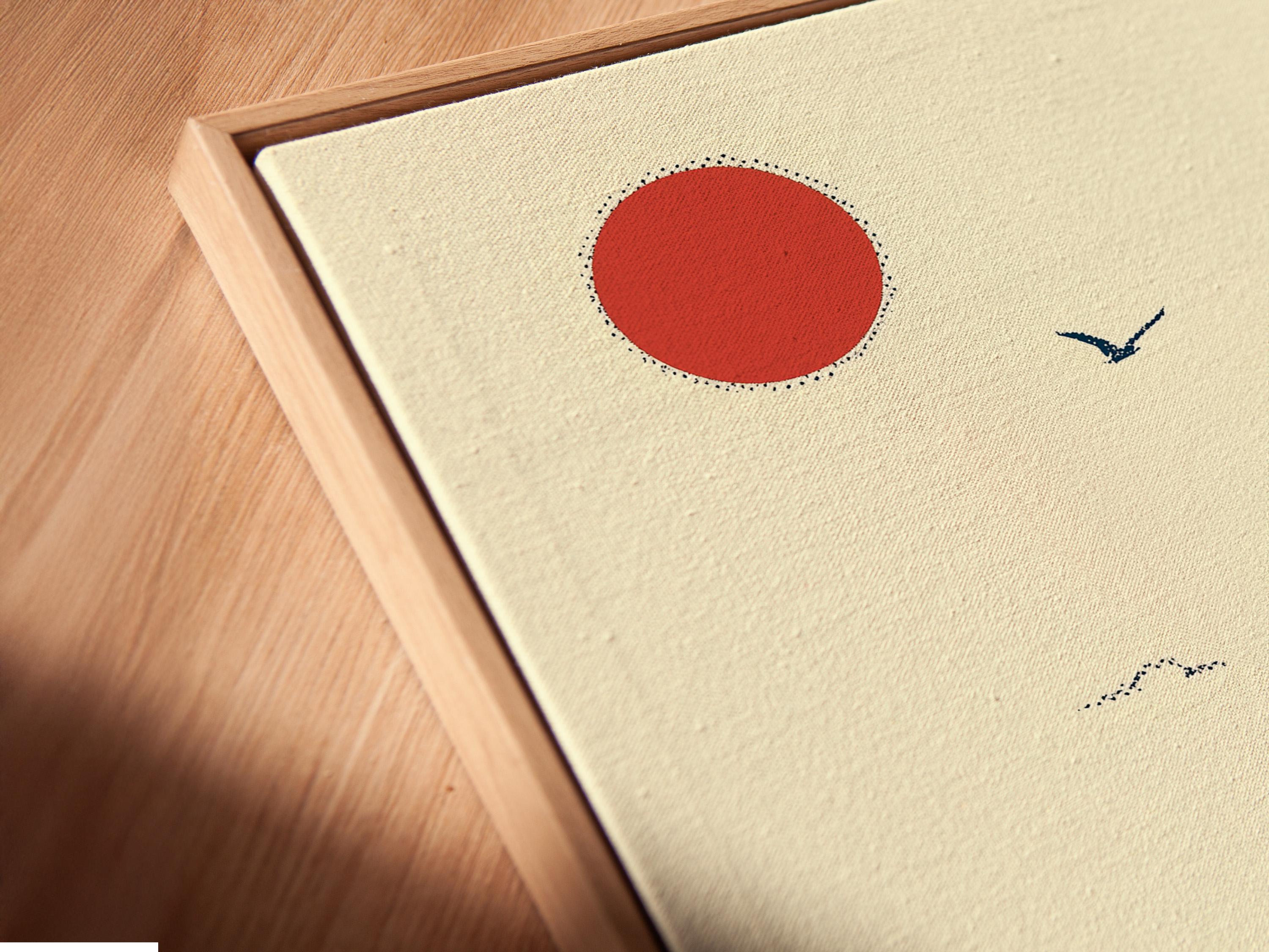 Blue bird perched on a flowering branch with red blossoms, red sun and blue landscape background detail view