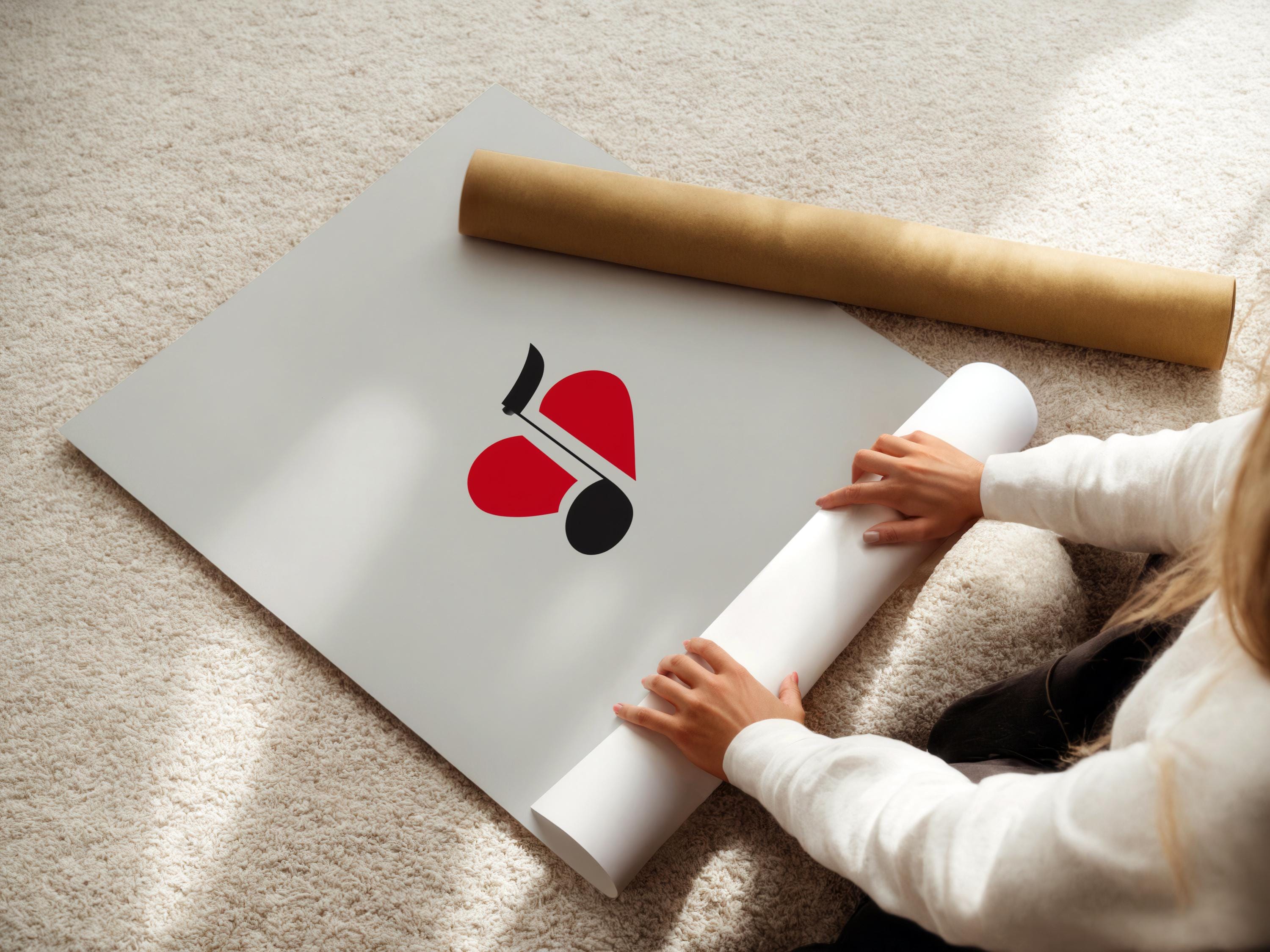 Wall mockup of minimalist red heart and black music note artwork