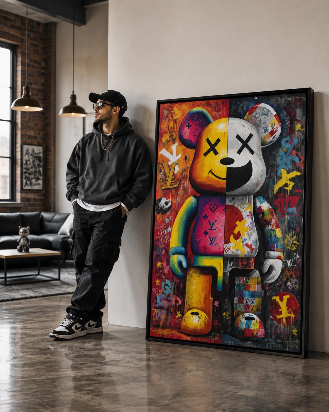A bright pop-art style bear figure is shown amid graffiti-like colours and stickers, framed by bold black outlines and layered poster textures detail