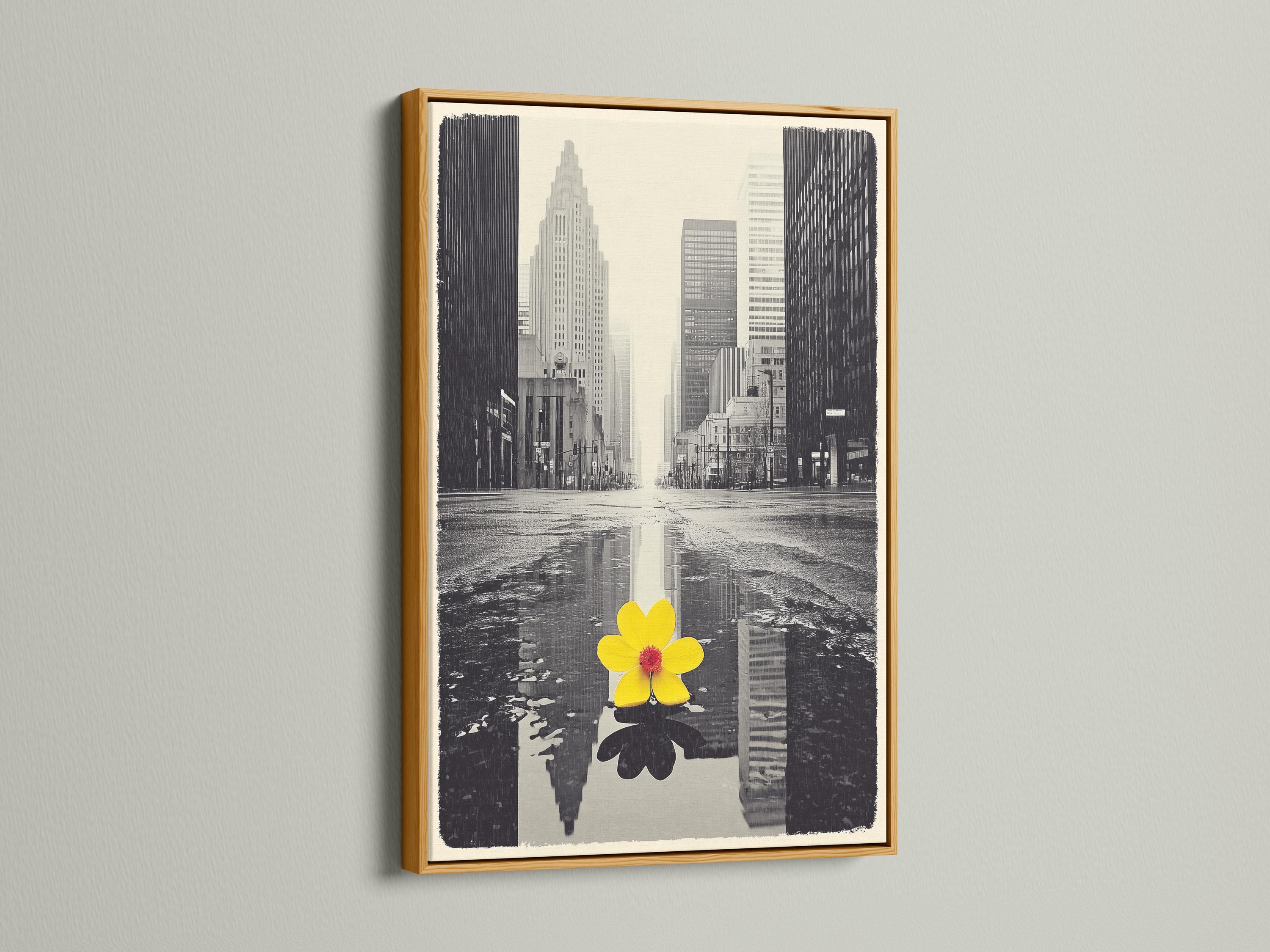 A monochrome city skyline is overlaid with a single bright yellow flower, reflected in water-like bands, creating a high-contrast urban accent detail