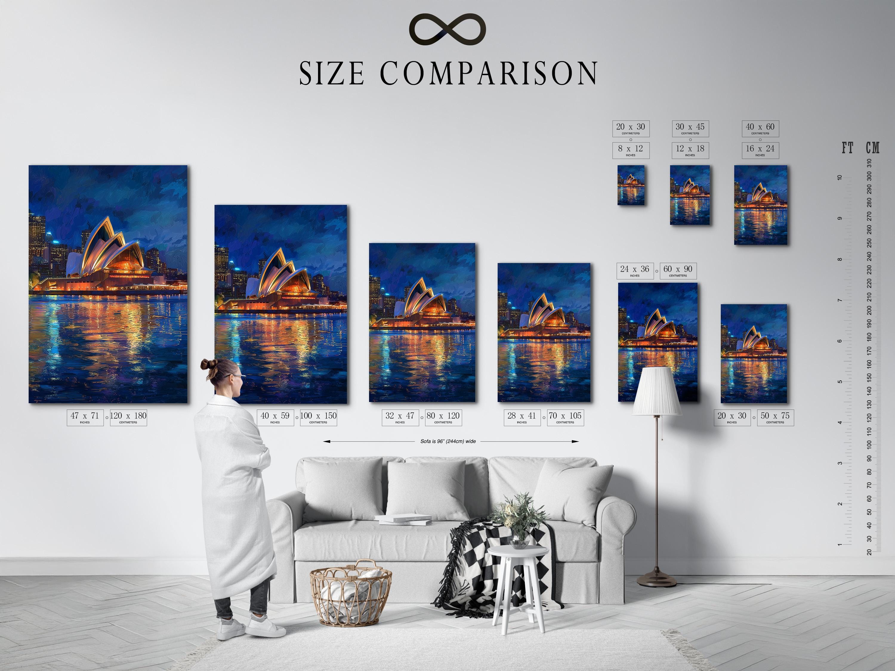 Framed night cityscape artwork featuring a glowing building and reflected lights on water
