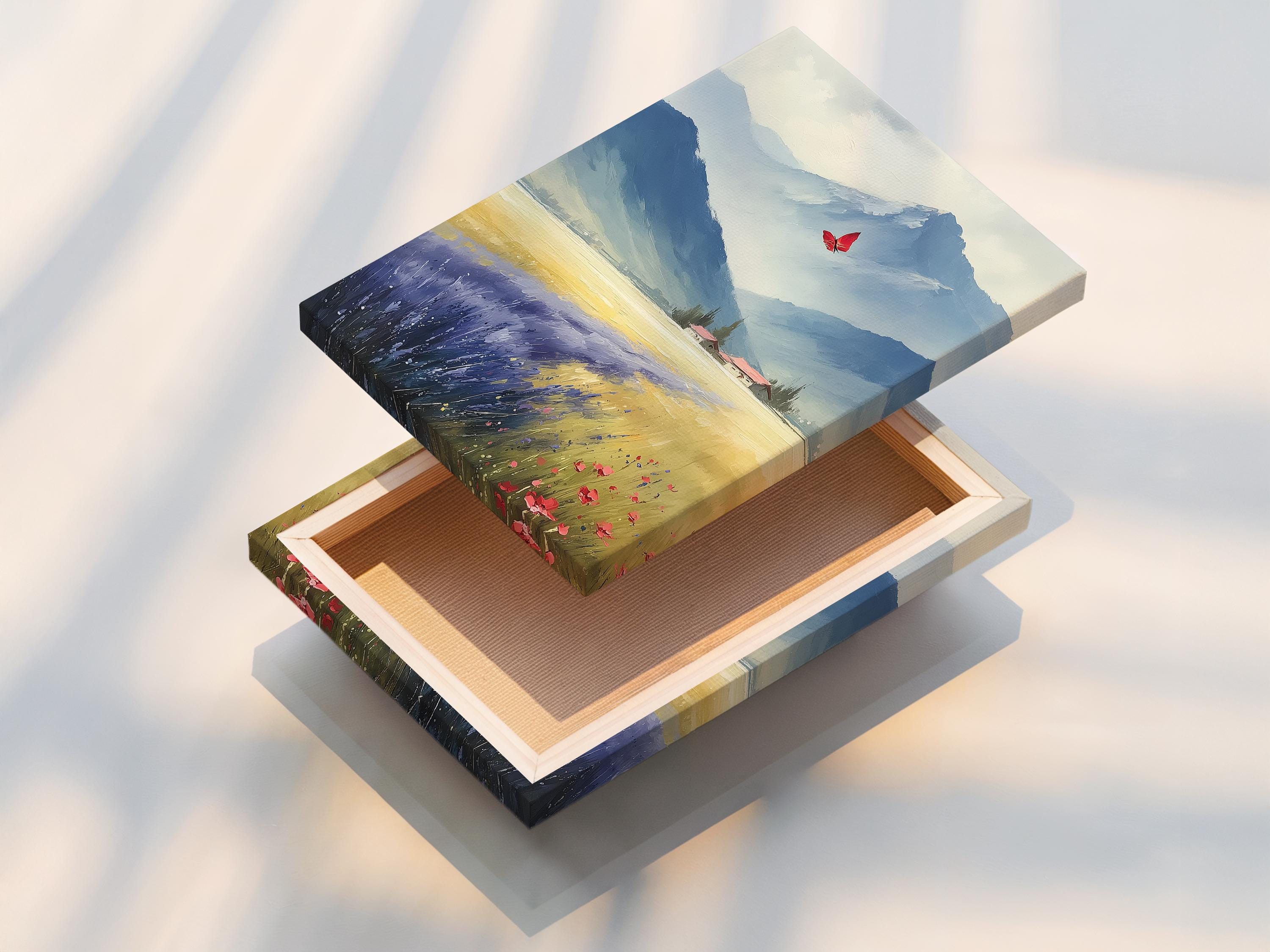 Room mockup showing a framed blue mountain landscape artwork with a red butterfly