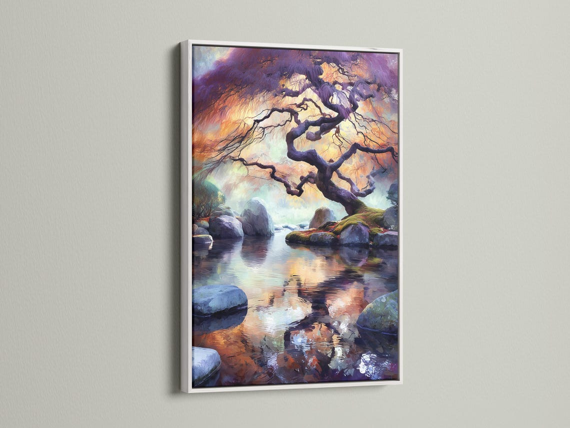 Twisting tree silhouette over rocks and still water with purple orange sunset reflections detail view
