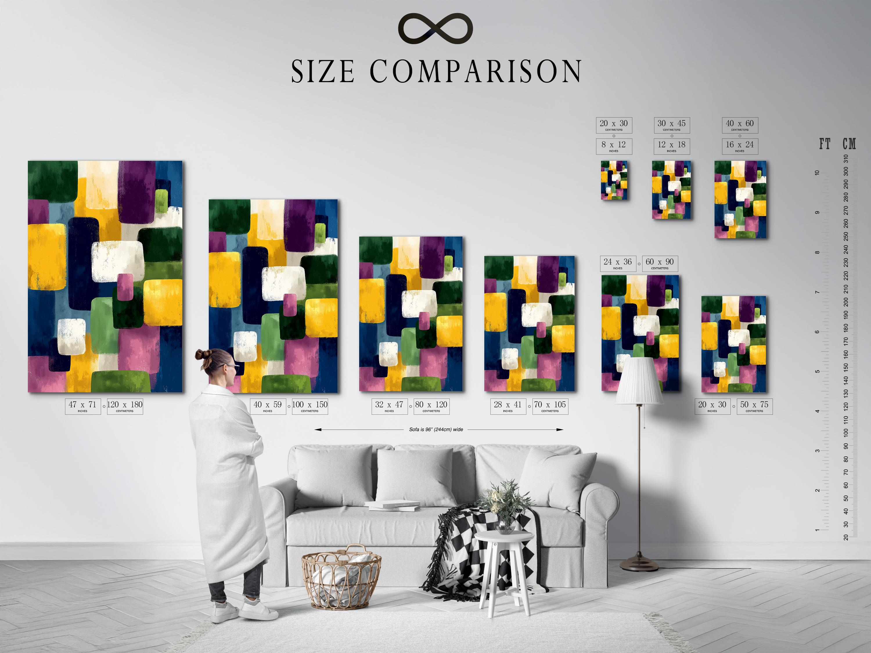 A framed geometric abstract artwork features overlapping colourful blocks—green, yellow, purple, blue and white—arranged in an irregular, layered