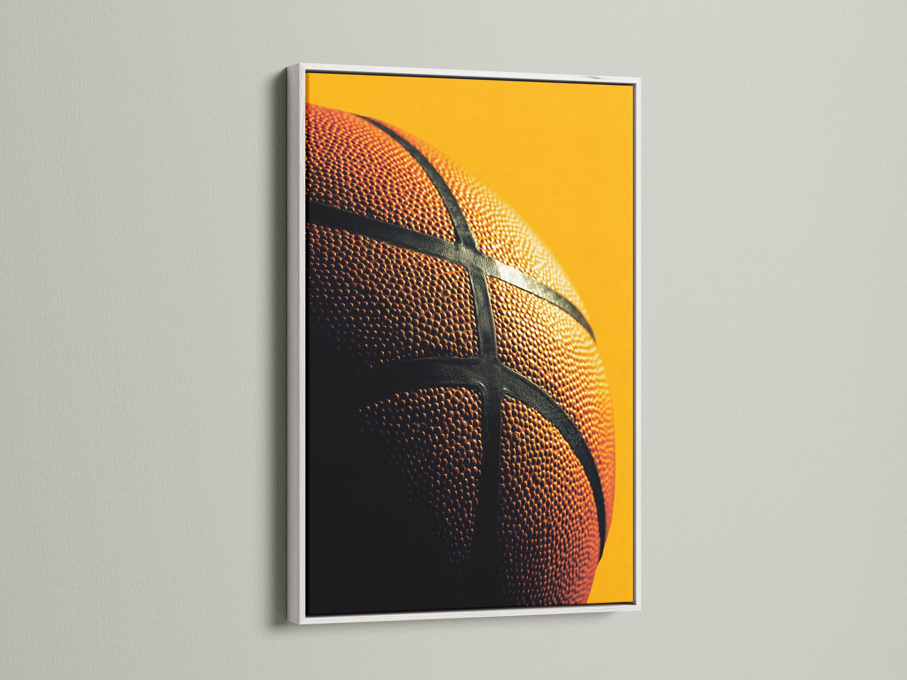 Close-up basketball surface with orange dimples and dark curved grooves