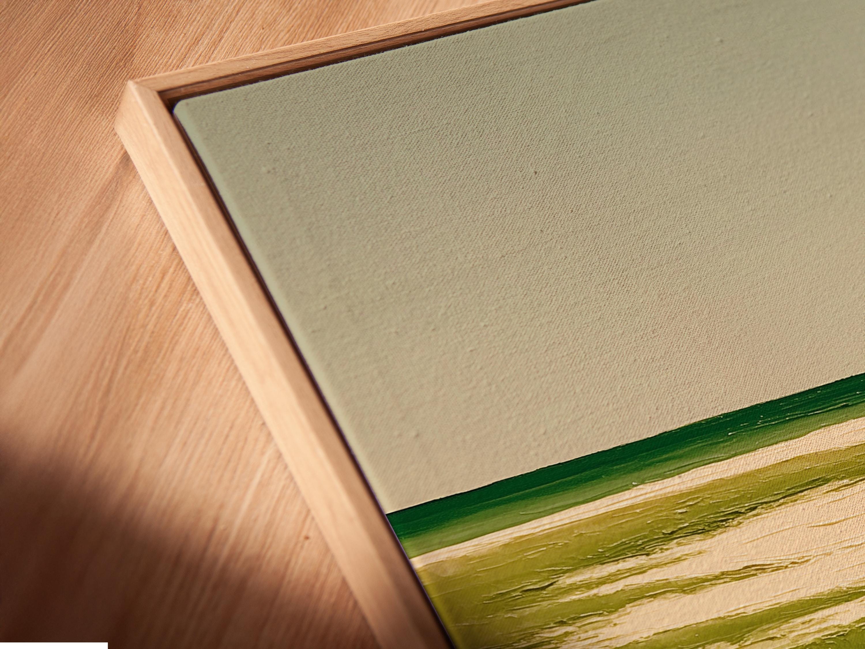 A framed landscape artwork on a light background wall showing green meadow grasses and cream flowers