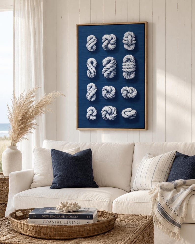 Nine white rope knots arranged on a navy blue background