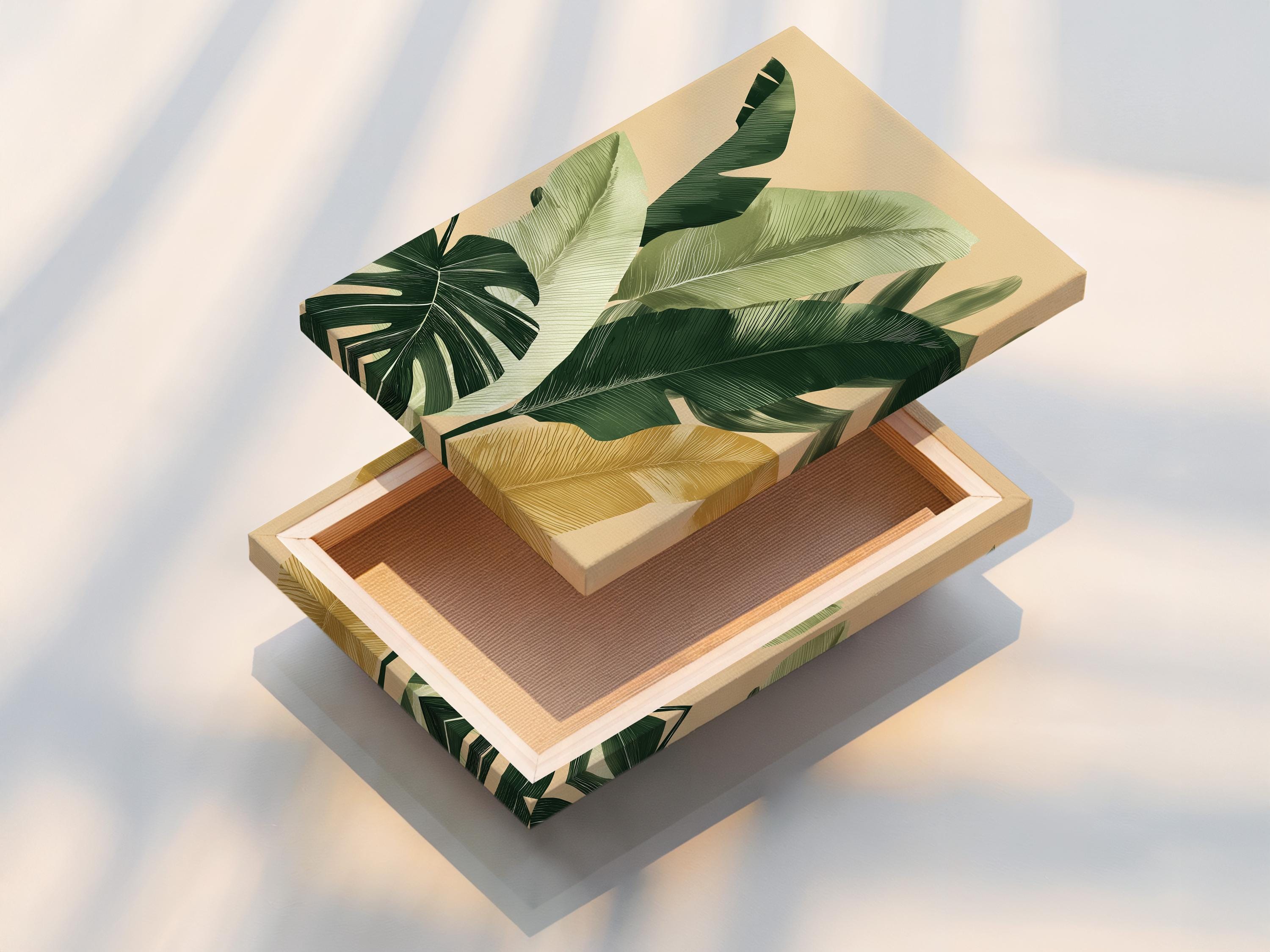 Botanical leaf artwork shown on a framed wall display with additional product views around it