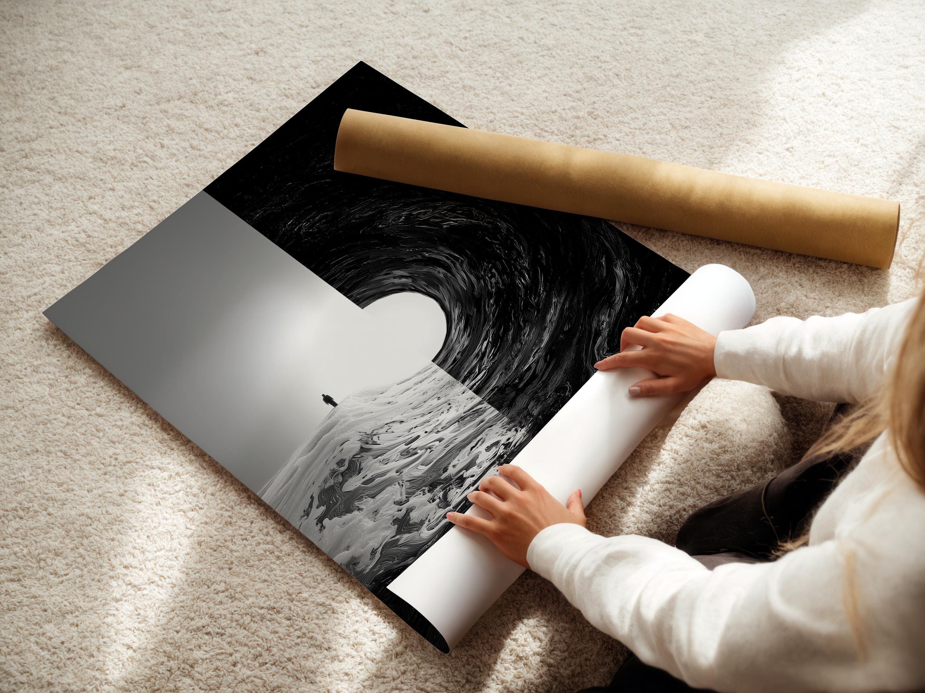Room mockup showing monochrome framed artwork with a small standing figure and swirling black area
